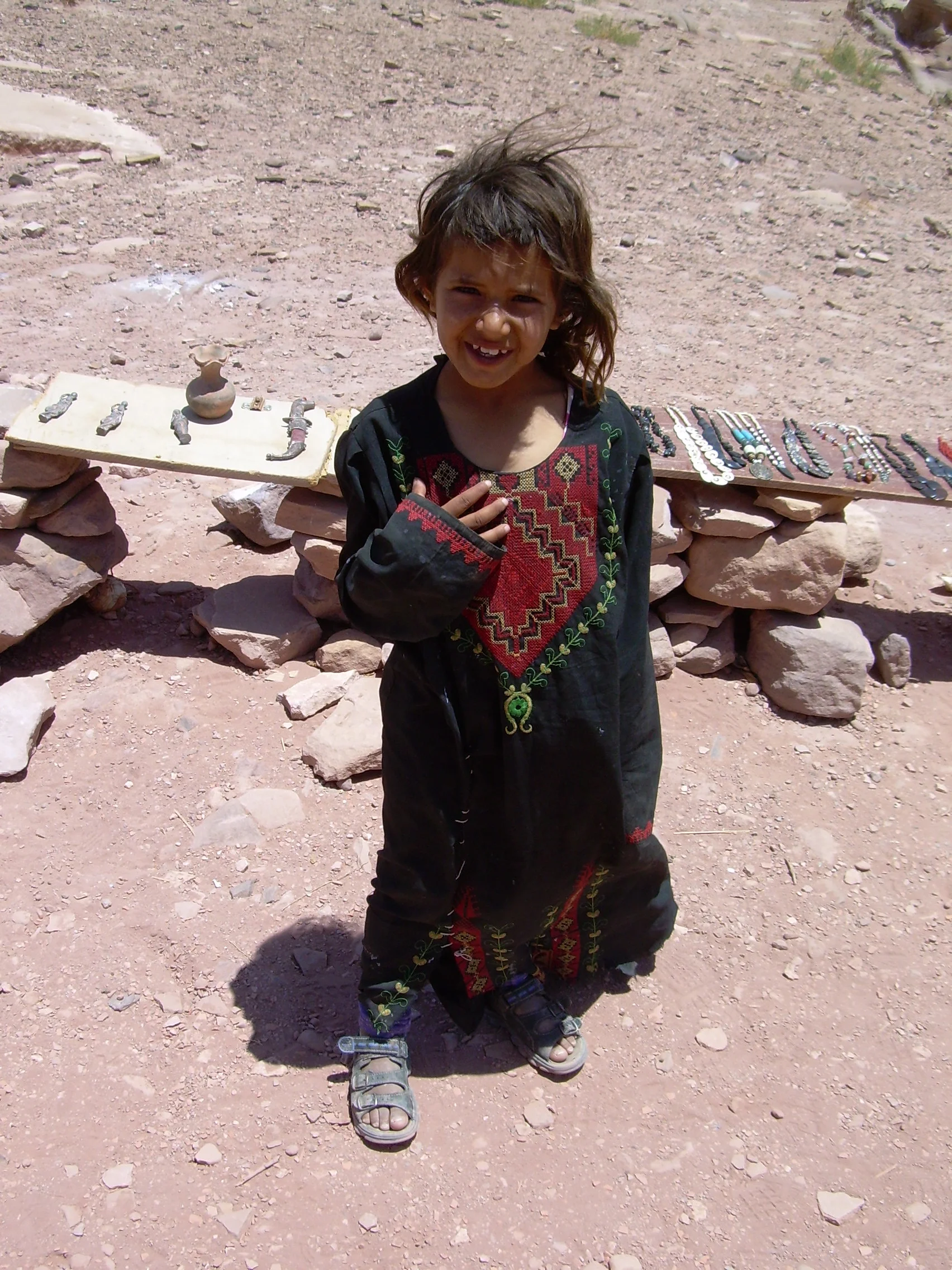 image: Jordan, Petra 2012. A little bedouin girl trying to sell her crafts and chat.