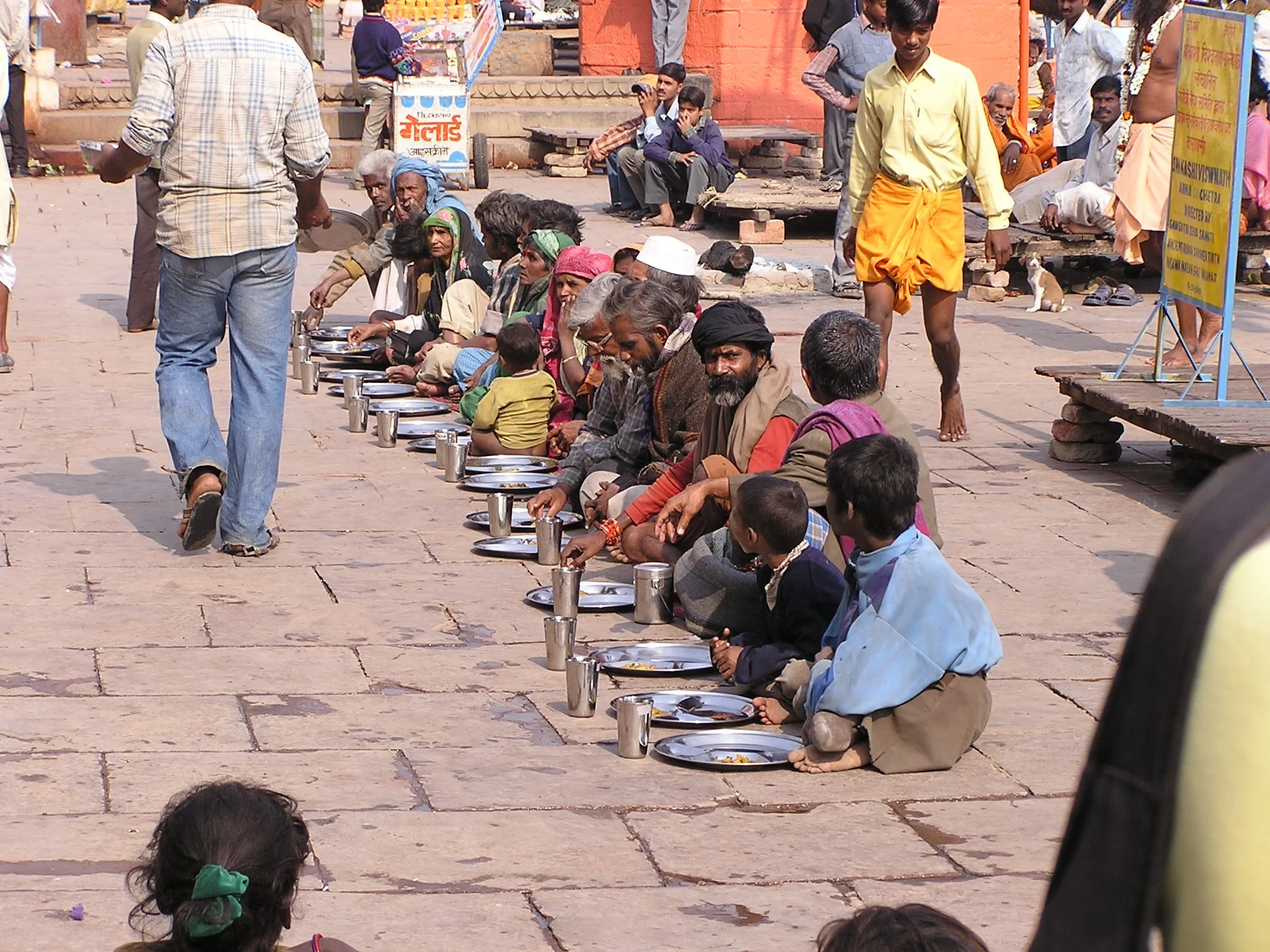 image: Varanasi, 2001. The charity meal for the poor. Lined up to receive meager nutrition. Varanasi was an experience of contradiction, confusion, love and disgust. I wanted to stay for 3 weeks, a year, to understand deeply the gestures, the fears and the intensity. I know i will return.
