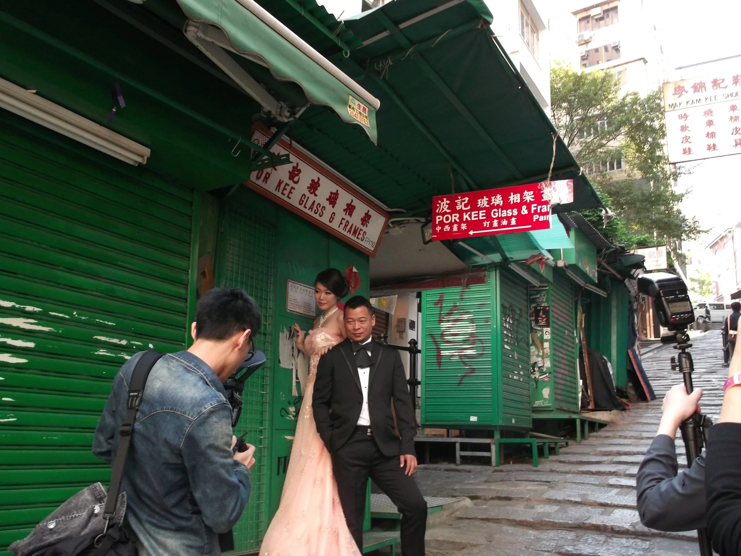 image: Hong Kong at the market, 2011. One wedding party after another made its way to the market, posed, smiled and hoped.