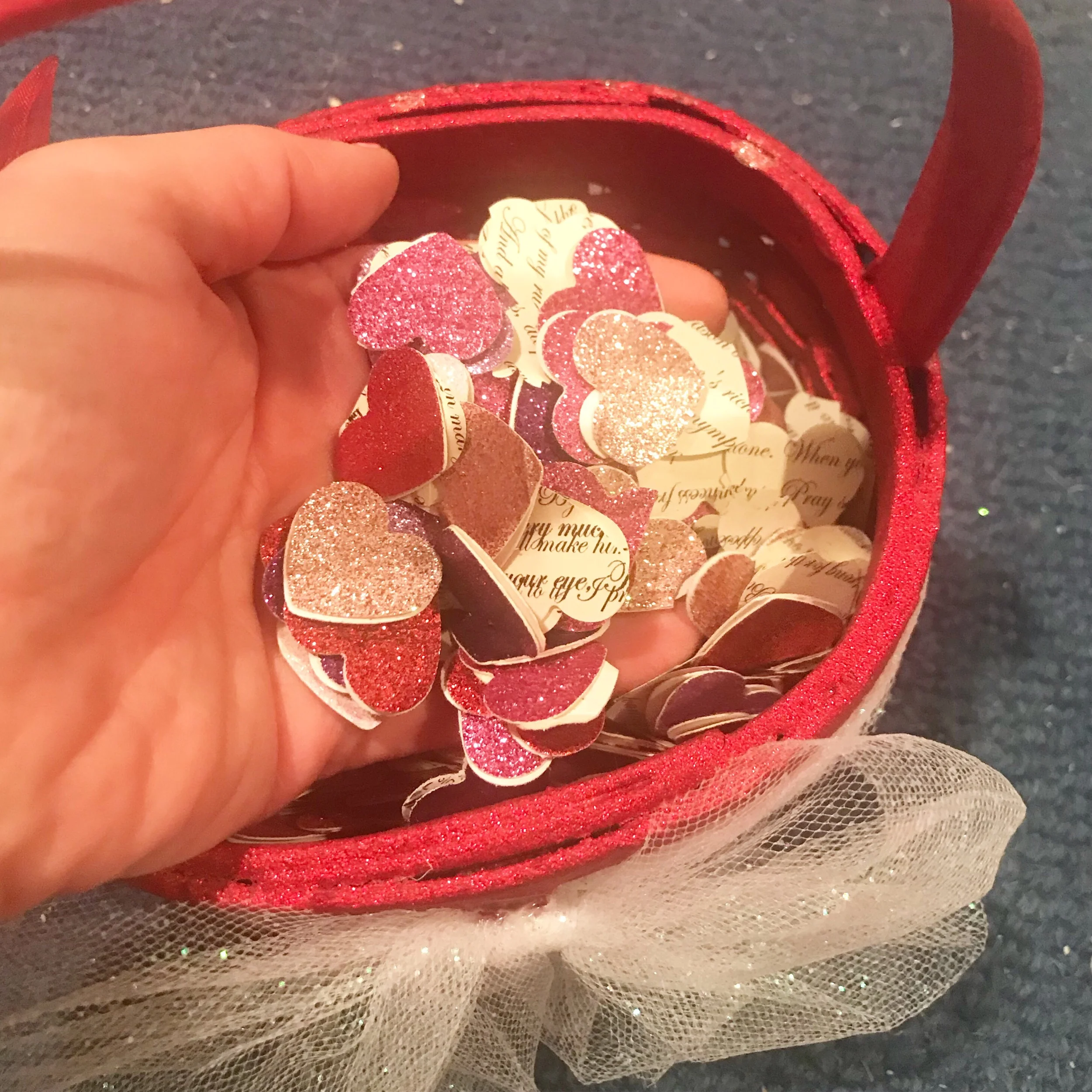 Glitter and Shakespeare Heart scatter! I also painted the flower girls’ baskets bright sparkly red.