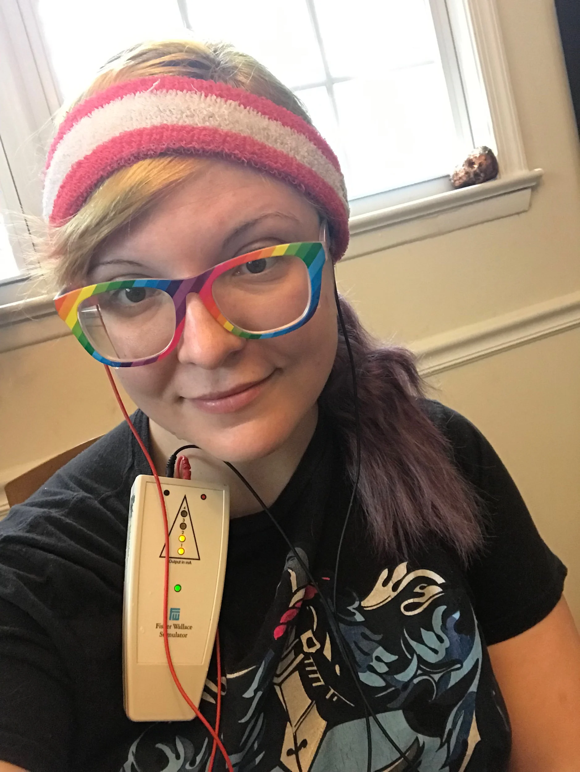Selfie-ing it up with the Fisher Wallace Stimulator. I tend to use a sweatband with it instead of the included Velcro headband; it just has always worked way better for me.