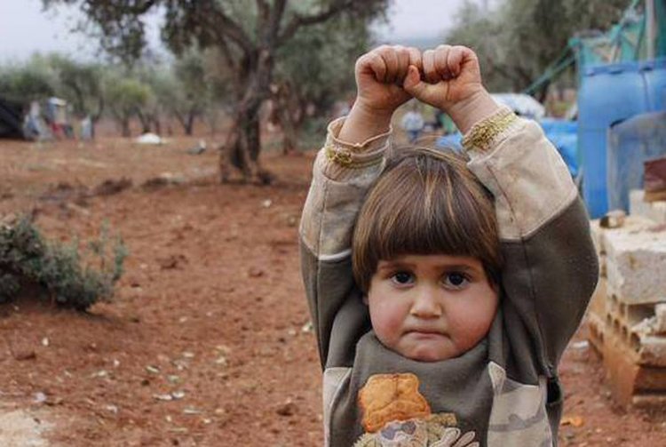 a-four-year-old-Syrian-girl-surrendered-when-a-photographer-pointed-his-camera-at-her...-and-she-assumed-it-was-a-gun.jpg