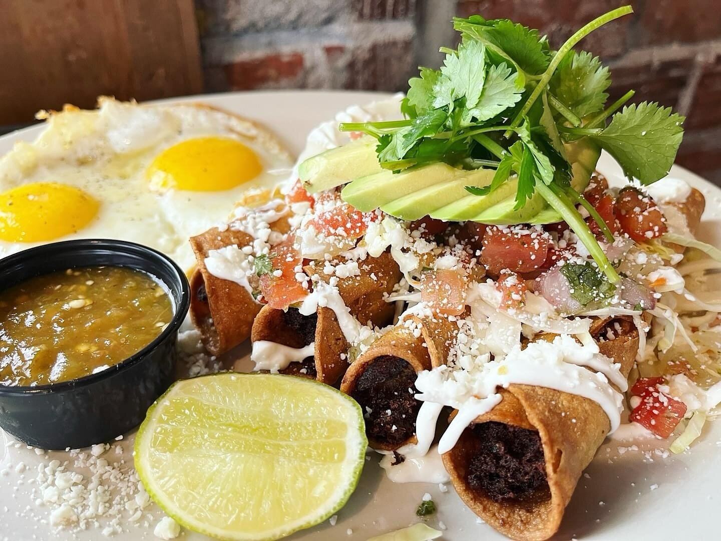 One of your favorites is back&hellip;Taquitos for breakfast! 🤤 Dorados y Huevos&ndash;Crispy fried ground beef and potato taquitos topped with cabbage, pico, sour cream, cotija, avocado &amp; cilantro, served with two eggs and roasted salsa. On spec