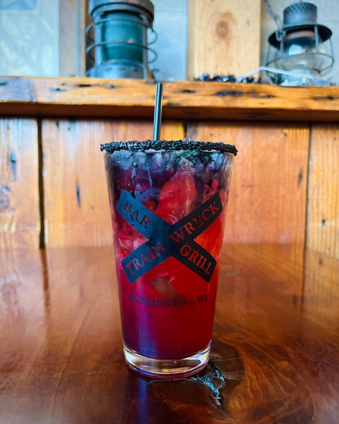 Join us every Monday for Margarita Monday at Train Wreck. This week we have a Spider Bite Margarita, made with cranberry purée and a spooky black sugar rim, $11. 🕷️