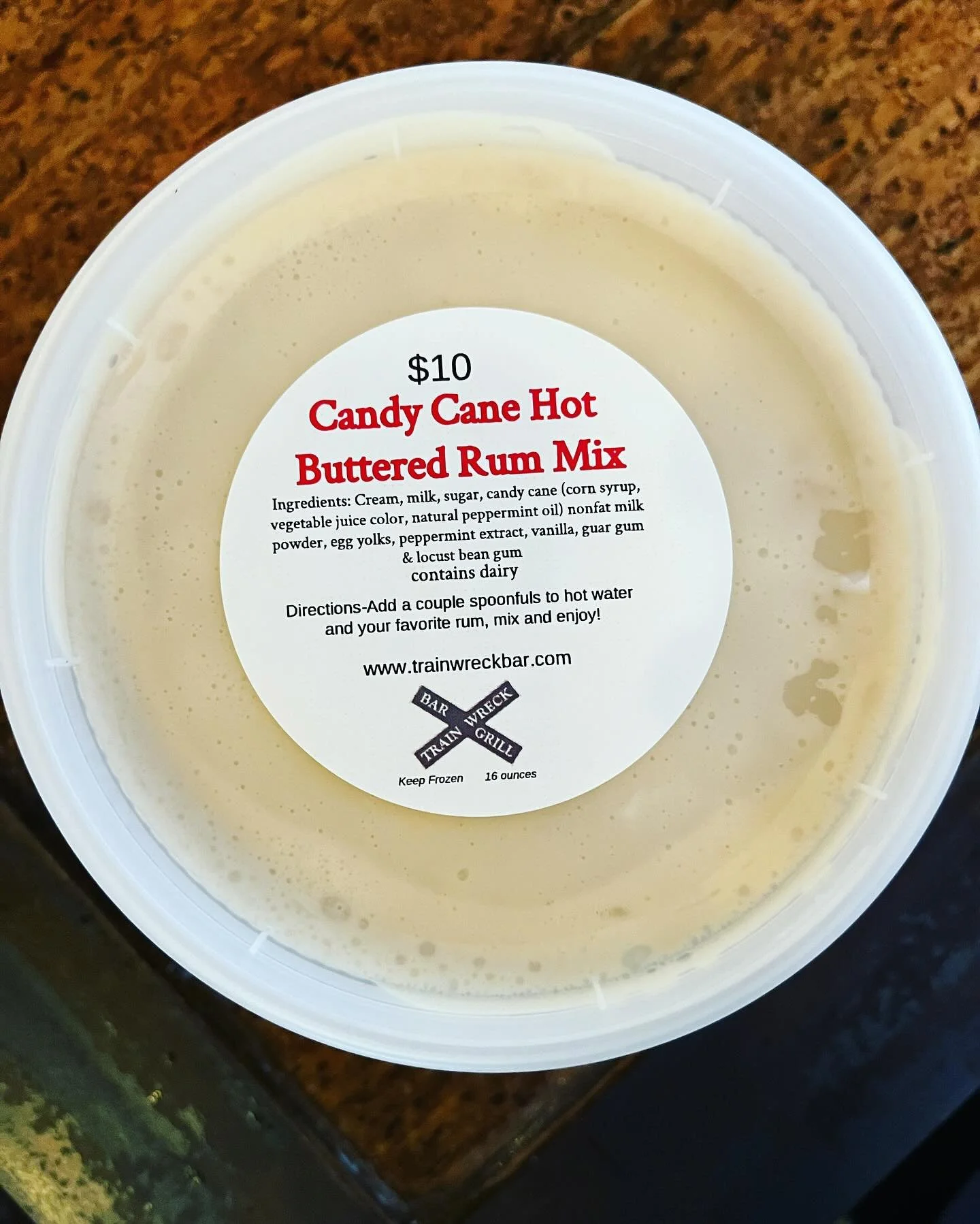 We have Candy Cane Hot Buttered Rum Mix available for take home and drinks in house at Train Wreck. Come and get it before it's gone!