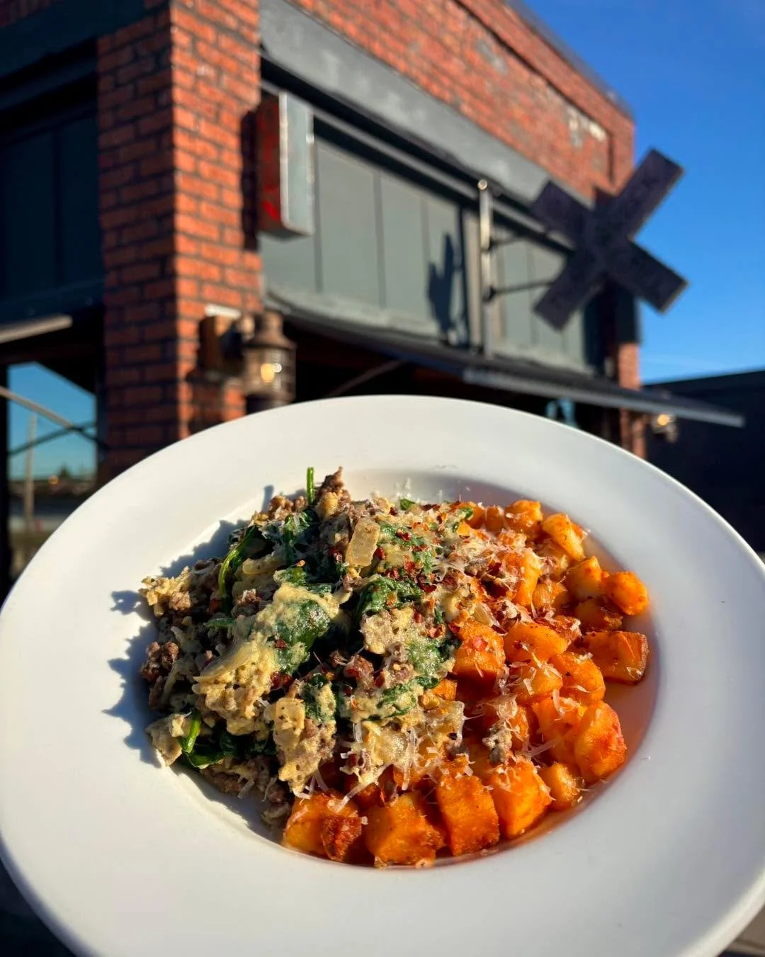 Joe&rsquo;s Special is available for a couple of weeks for breakfast! Breakfast potatoes tossed in house red sauce and served with eggs scrambled with seasoned ground beef and spinach, topped with parmesan cheese and red chili flakes. 🍳 🥔