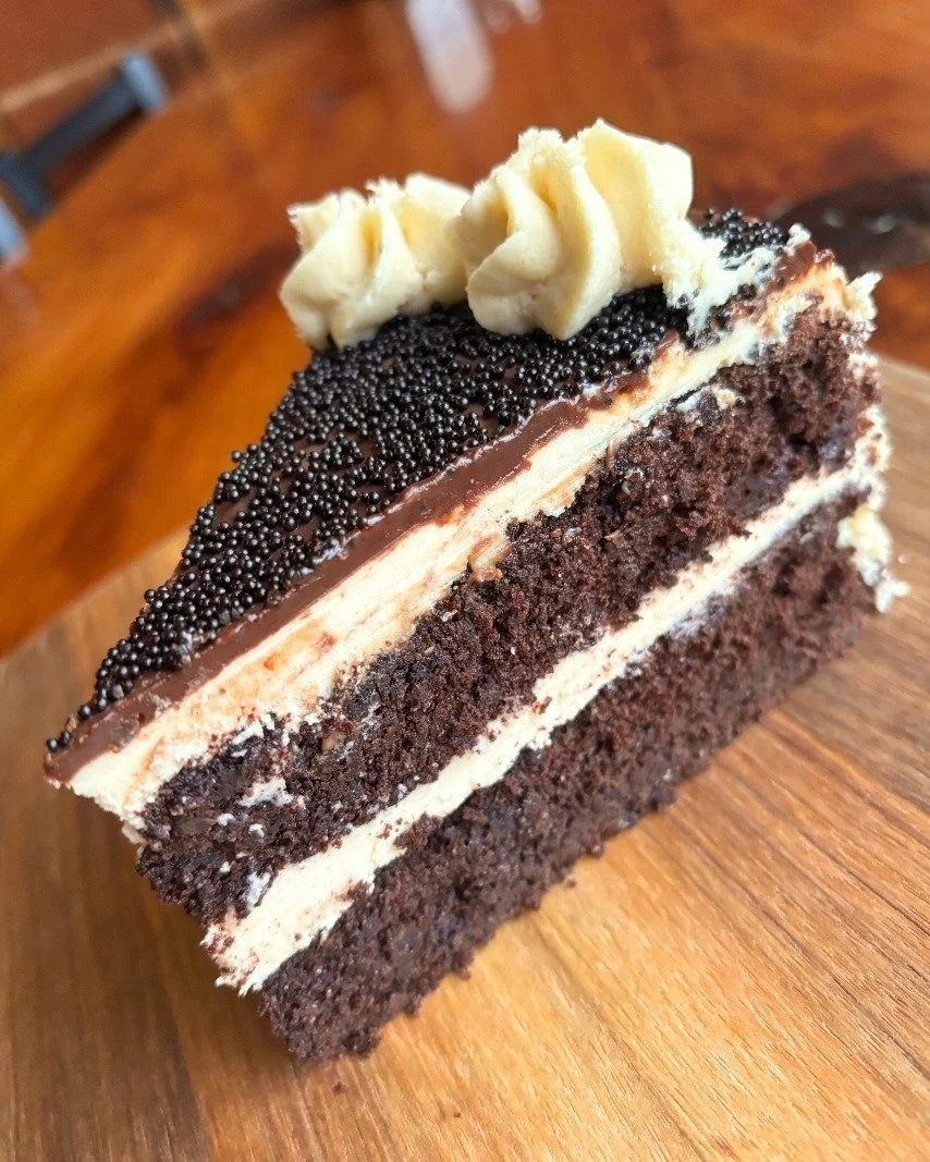 Irish Car Bomb Cake is available today through St. Patrick&rsquo;s Day! Stout cake layered with Baileys buttercream and topped with Jameson ganache.