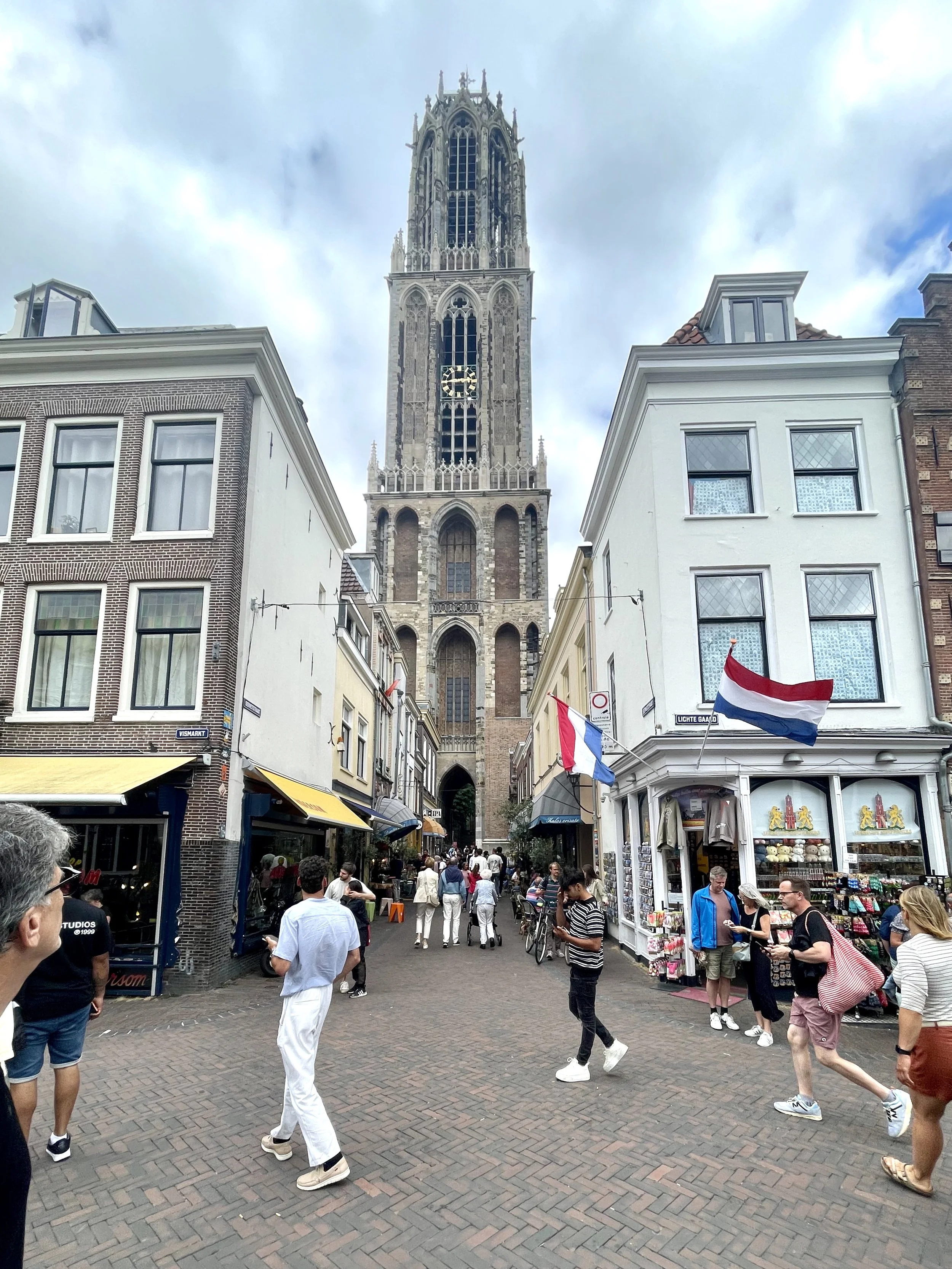 Walking down the street above the canal, the Dom church can be seen.