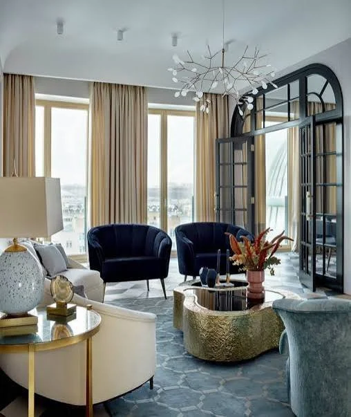 European living room with layered textures, classic architectural details, and warm seasonal lighting.