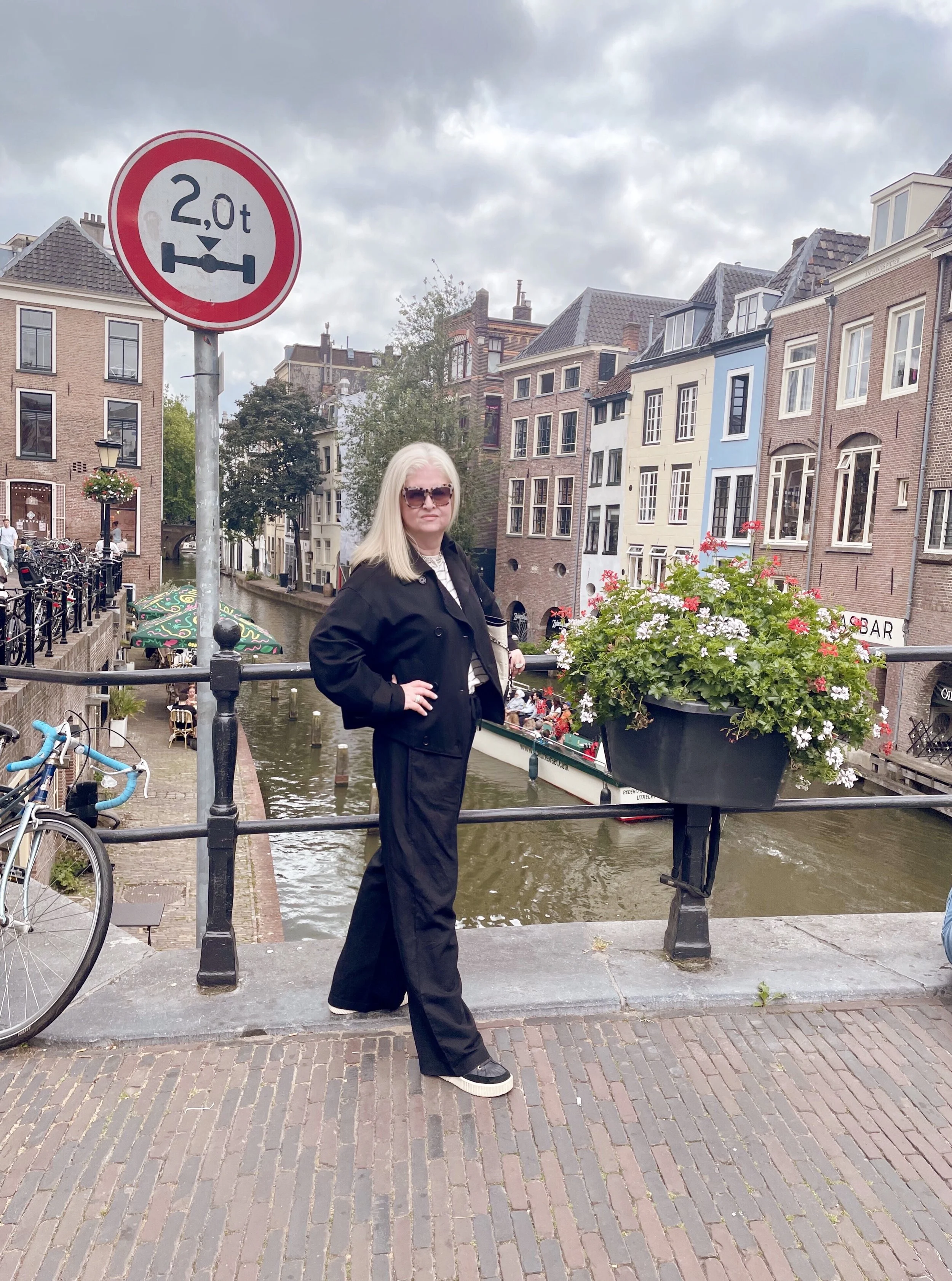 Denise Jadd, Interior Designer, as seen on the canal in Utrecht.