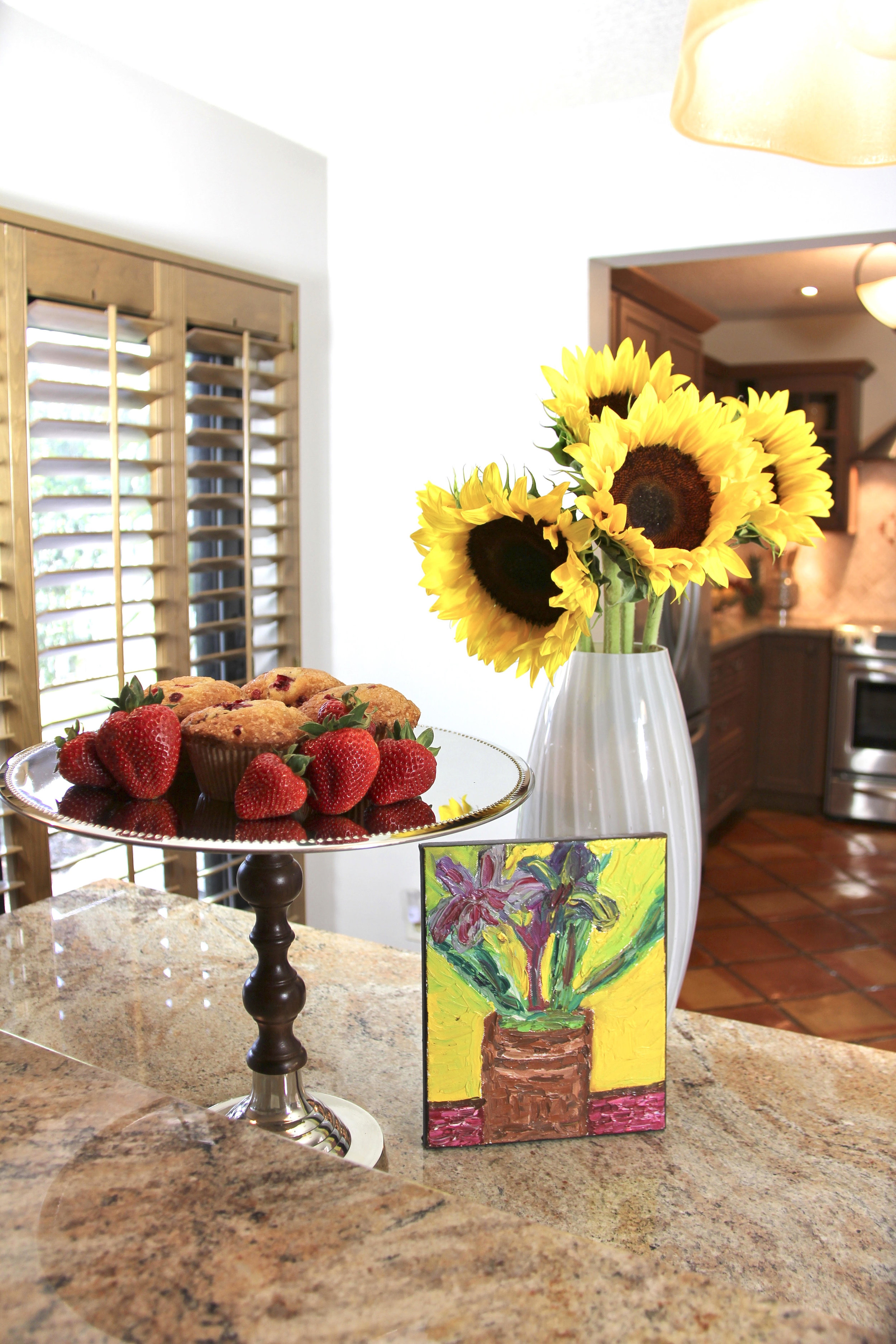 home staging in Delray Beach FL with floral arrangements  and fruit
