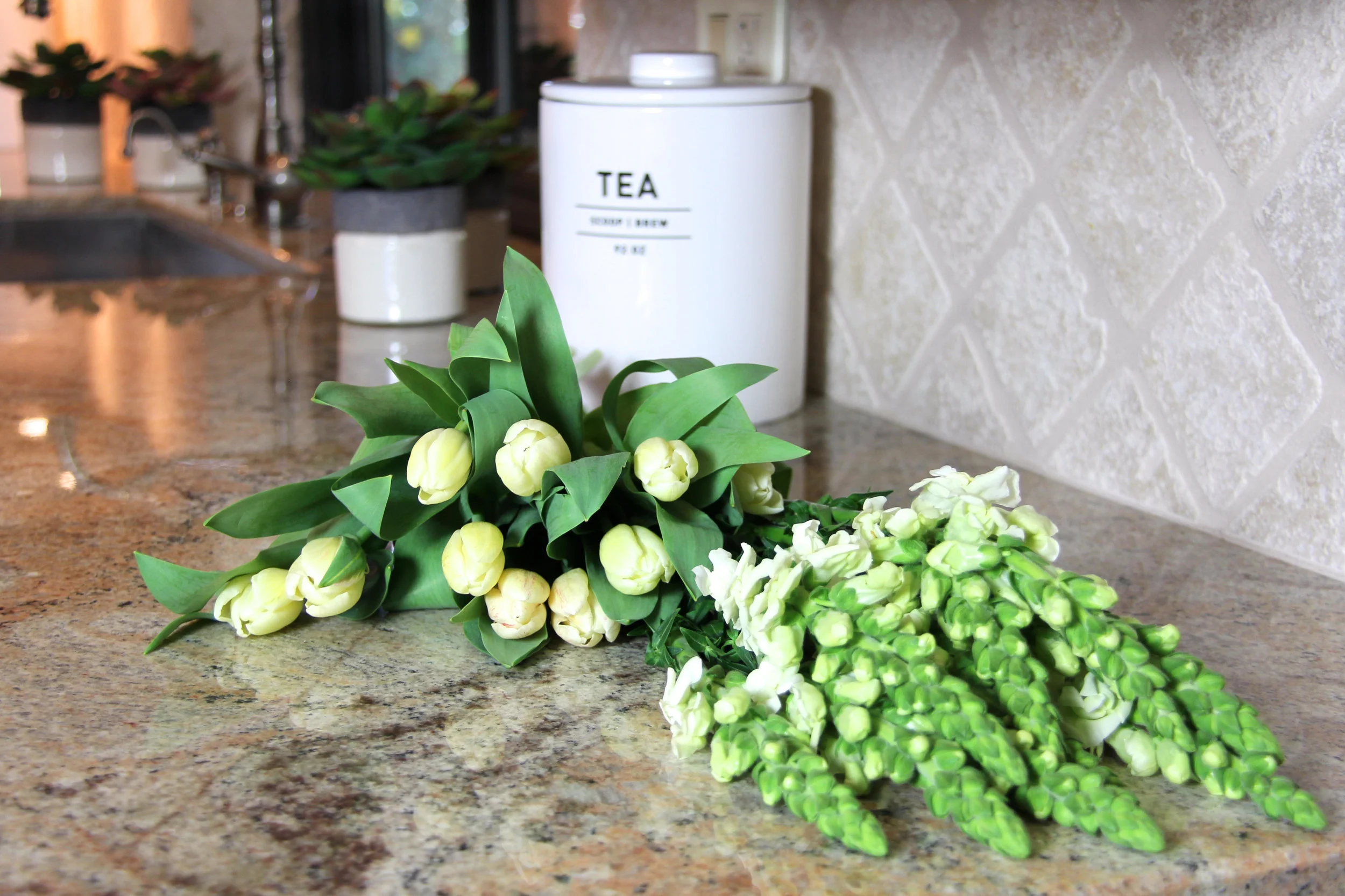 Home staging kitchen with flowers