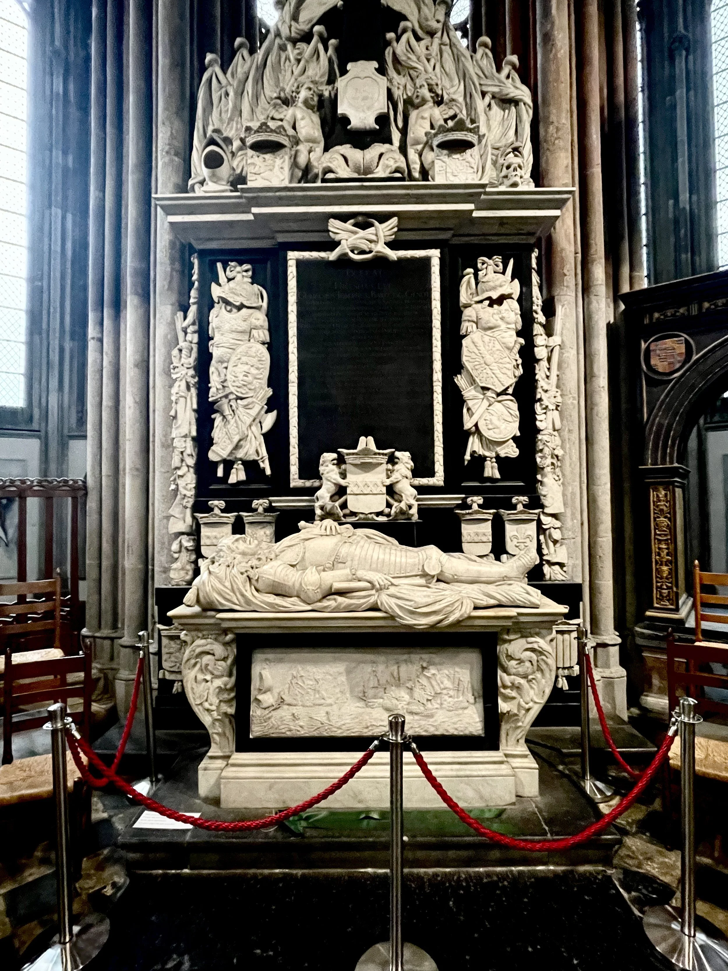 Utrecht Domkerk tomb memorial in black and white contrasts with the neutrality of the stone church.