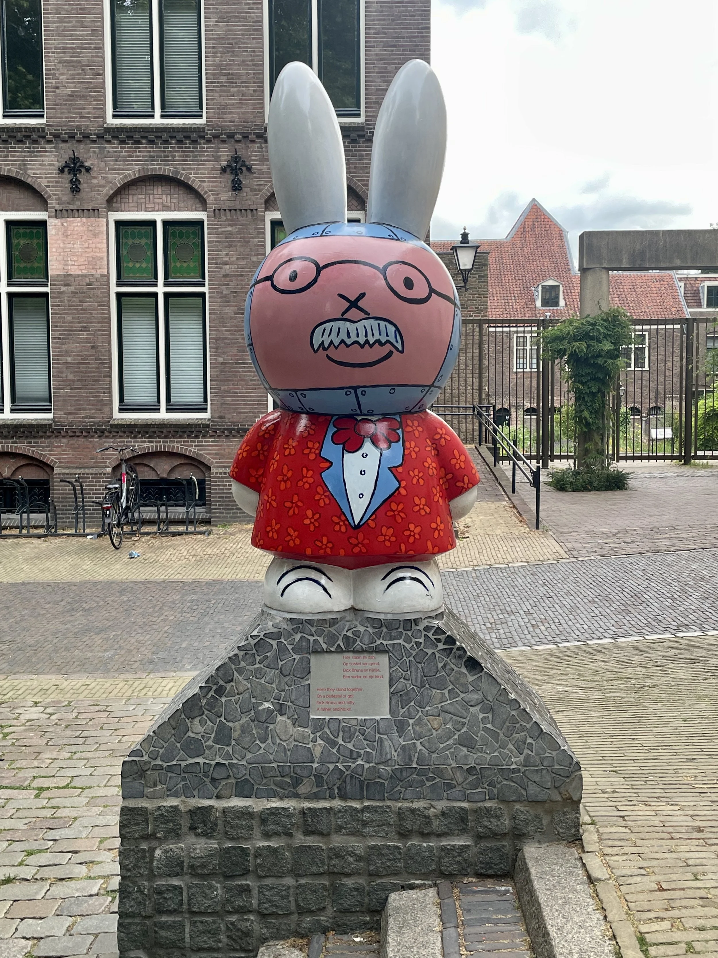 The 2015 Sculpture of Dick Bruna on one side with his creation of Miffy, on the other side.