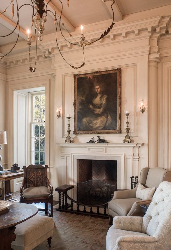 Palm Beach European-style living room with portrait above mantel