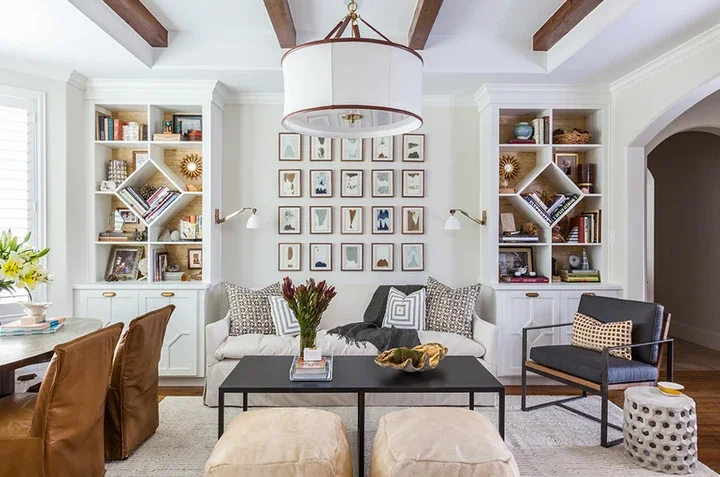 Transitional living room with built-ins and gallery wall palm beach luxury interior designer
