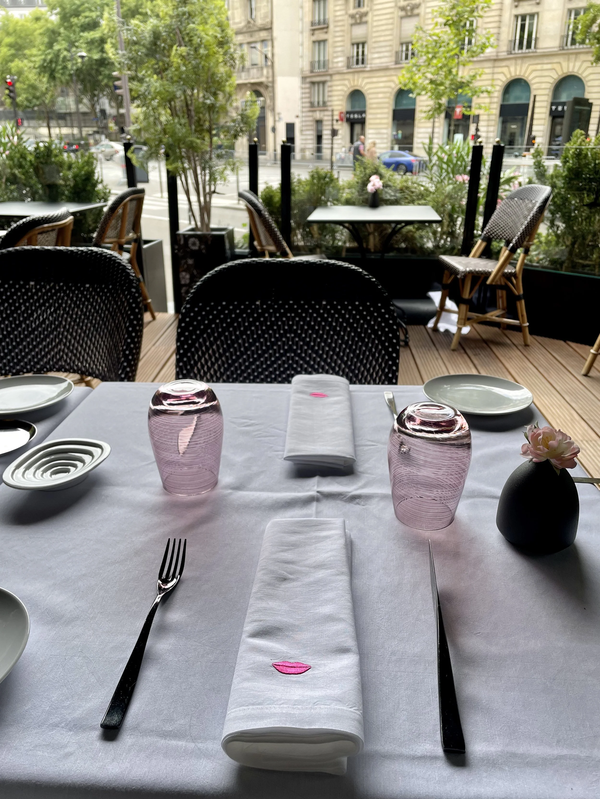The table setting with the iconic lips at the Fauchon Grand Café, on the terrace looking out at Madeline.