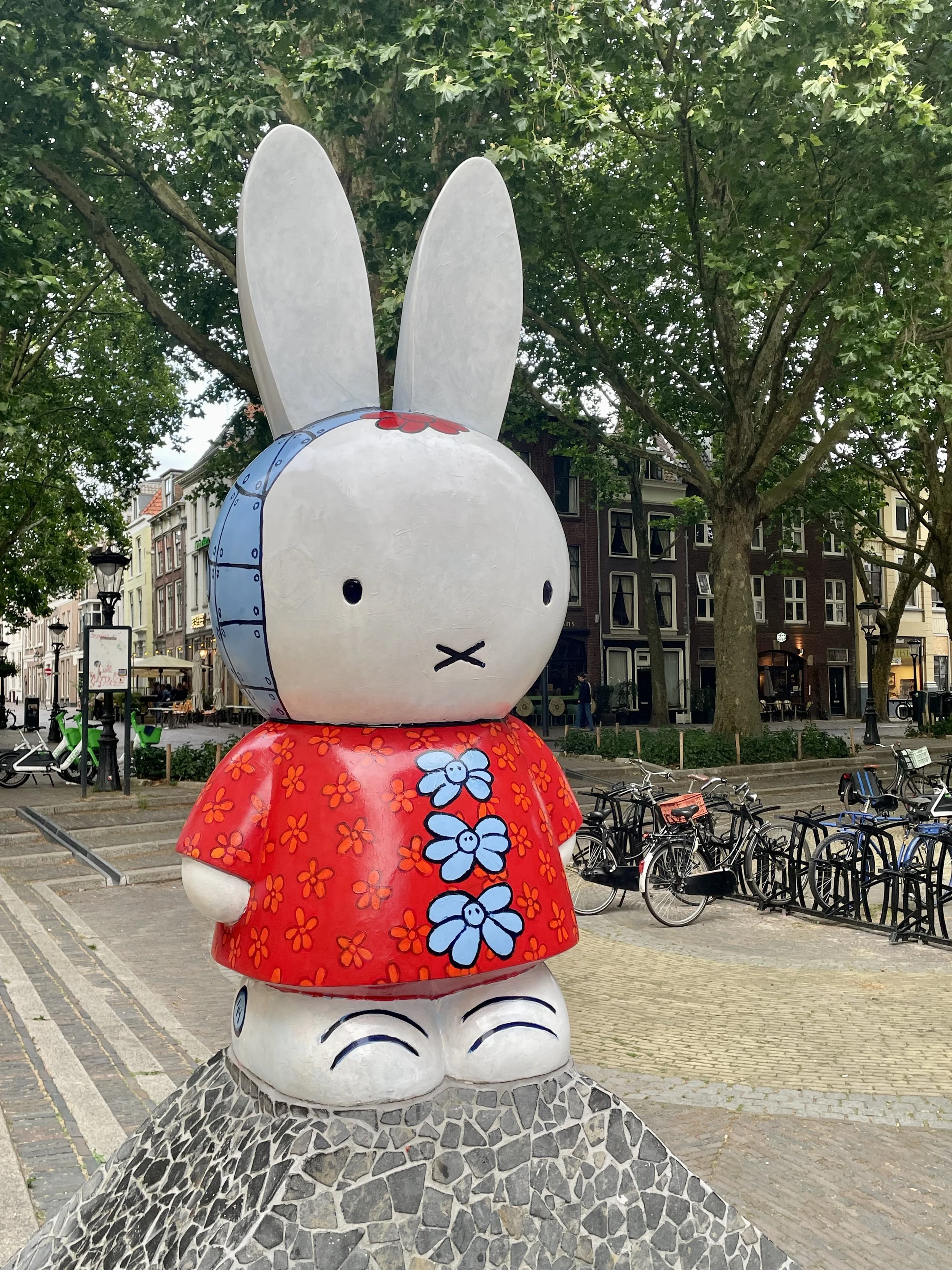 The 2015 Miffy Art Parade sculpture of the two sided Miffy and its creator, Dick Bruna is a surprise in a town of Medieval architecture.