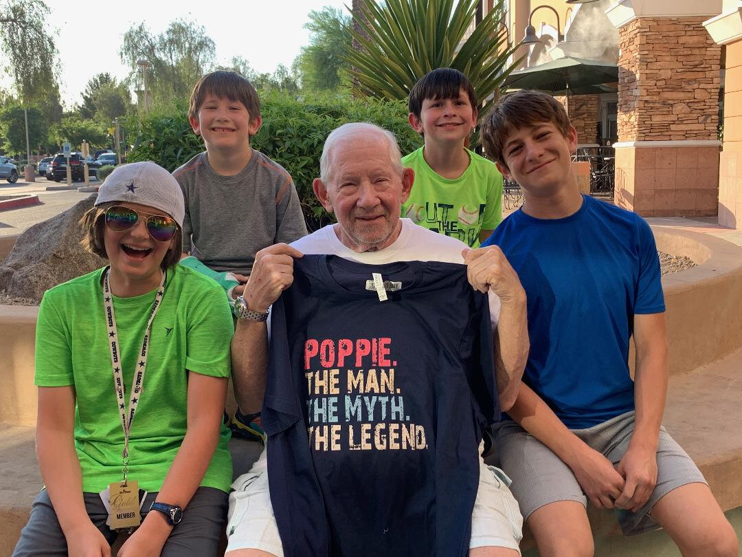  Arnie with his four grandsons, whom he loved. 