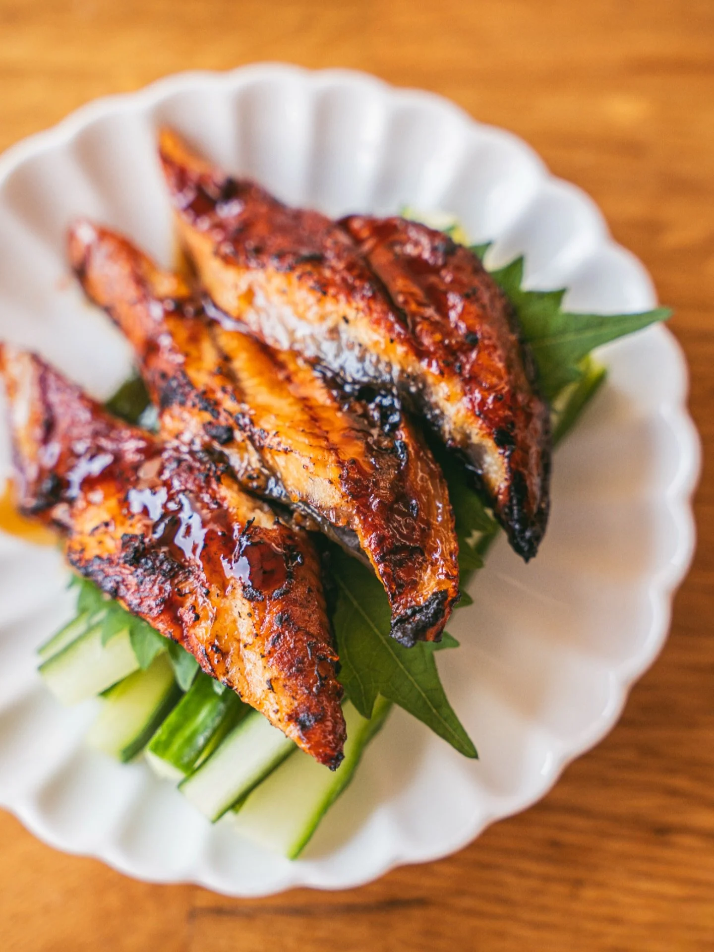 Unagi or freshwater eel, prized in Japanese cuisine for its rich, buttery texture and naturally sweet, umami flavor. 

We serve it grilled, as sushi, and even as sashimi. A true delicacy, unagi melts in your mouth and pairs beautifully with light soy