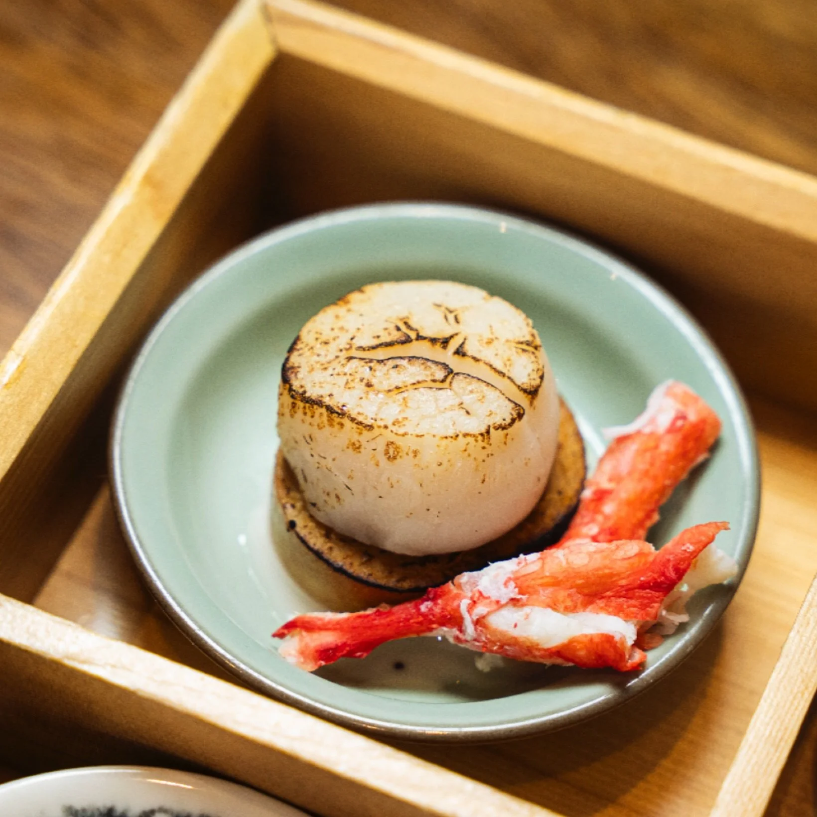 Delicate and refined, our Hokkaido Scallop captures the essence of the ocean&rsquo;s sweetness and purity. Expertly prepared to highlight its natural flavor and silky texture, it&rsquo;s a true expression of Japanese elegance at Izakaya Osen Irvine.
