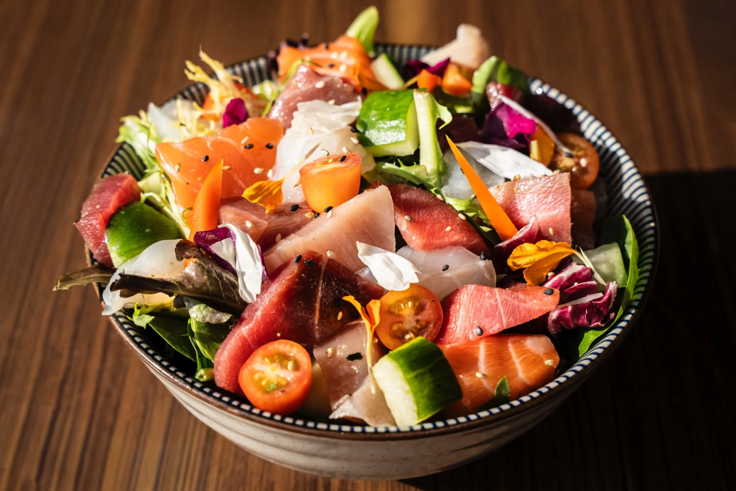 Fresh, crisp, and full of umami, our &ldquo;Sashimi Salad&rdquo; brings the best of the sea to your table with vibrant veggies, delicate sashimi, and a punch of ginger dressing. Perfect for sharing, perfect for savoring

#IzakayaOsen #SashimiSalad #J