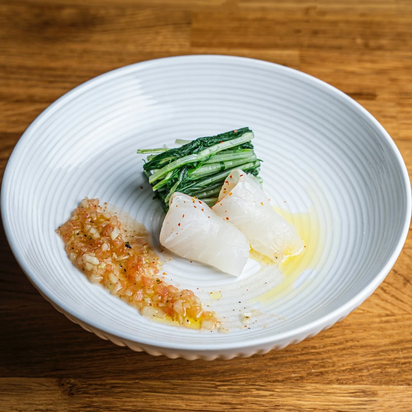 #DineLA Menu 🥳

🌸 Halibut with Mizuna 🌸
Delicate halibut sashimi layered over crisp mizuna, accented with yuzu skin sauce, finely diced tomato, and refreshing cucumber.