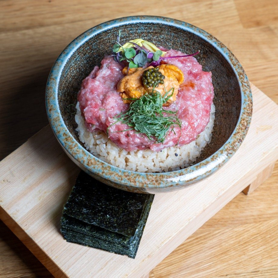 Toro Uni Bowl ✨
Chopped toro, fresh uni, and caviar layered over perfectly seasoned sushi rice. Finished with kizami shiso and a touch of sesame oil, served with crisp seaweed on the side.

Rich, delicate, and made to impress.