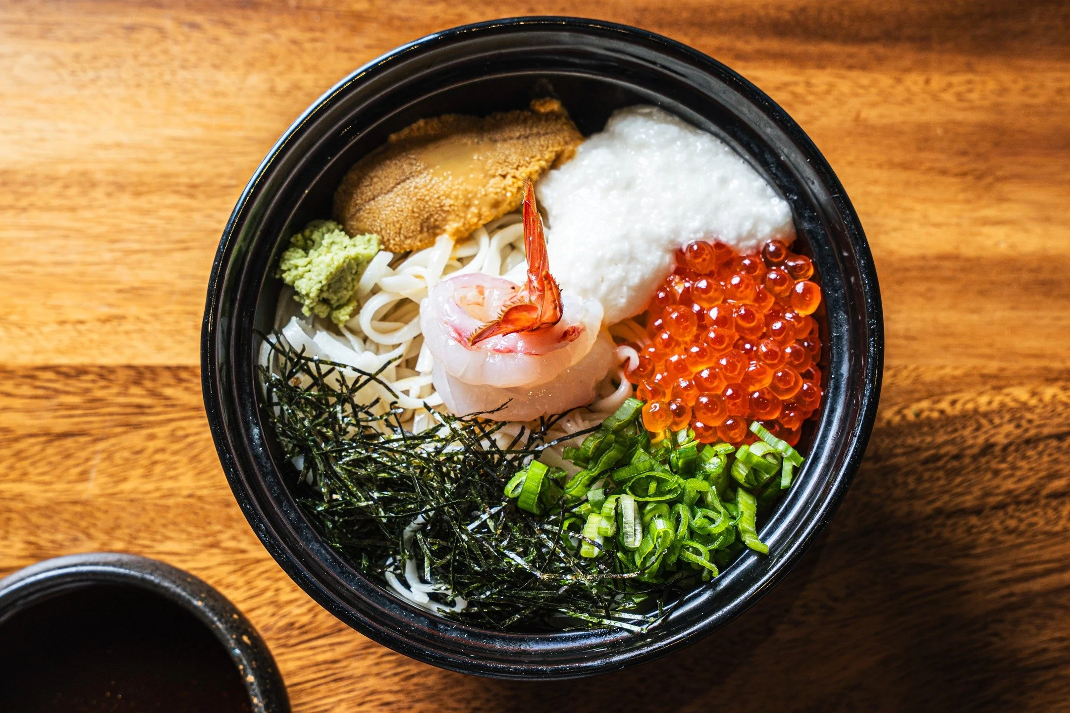 Cold Hiyashi Somen ❄️
Silky somen noodles served in chilled dashi broth, topped with uni, sweet amaebi, and ikura. Finished with Japanese mountain yam, fresh wasabi, kizami nori, scallions, and a touch of tsuyu.

Light, refreshing, and full of umami.