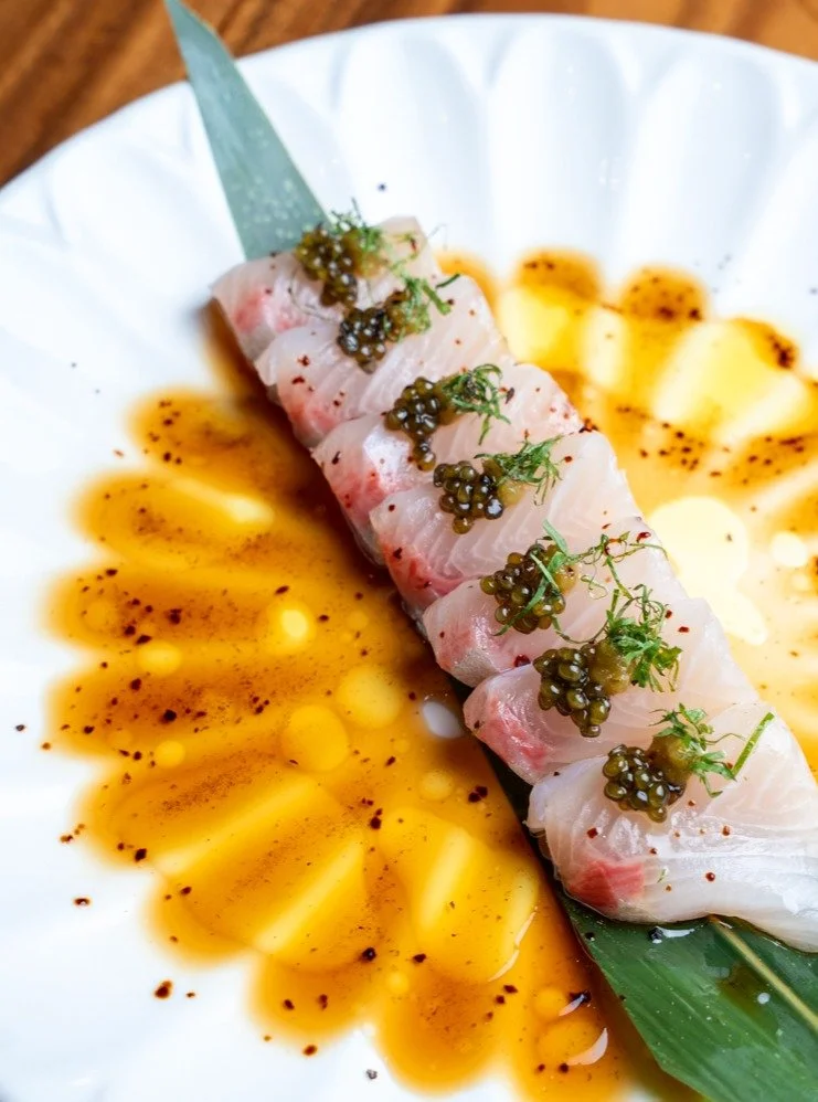 ✨ Yuzu Kanpachi Carpaccio ✨
7 pieces of premium kanpachi (amberjack) delicately layered with caviar, yuzu oil, ponzu, yuzu kosho, kizami shiso, and soy salt.

Bright citrus flavors, rich texture, and a refreshing finish in every bite 🍋🐟
A perfect b
