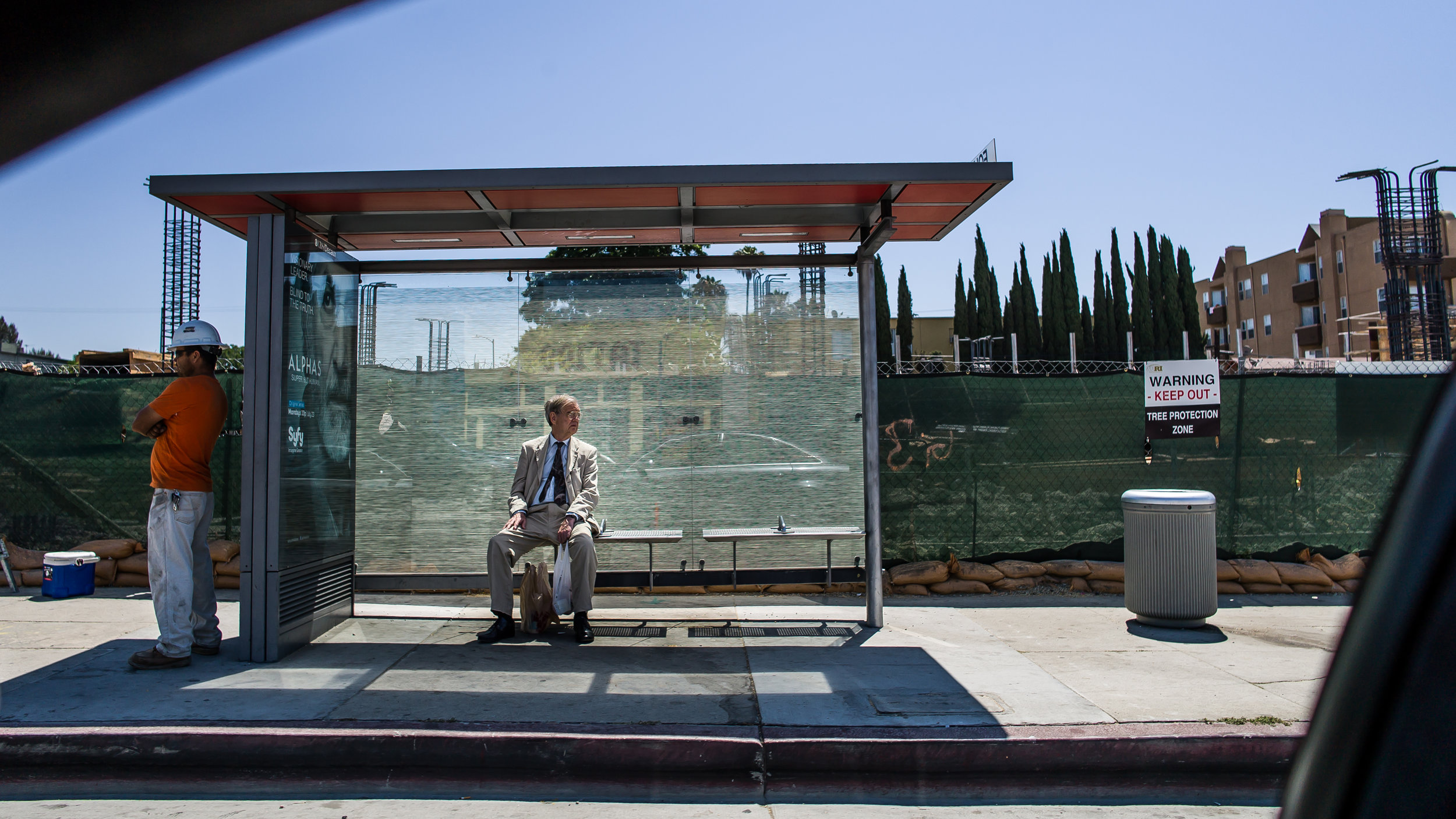 Man Waiting For Bus-Orange.jpg