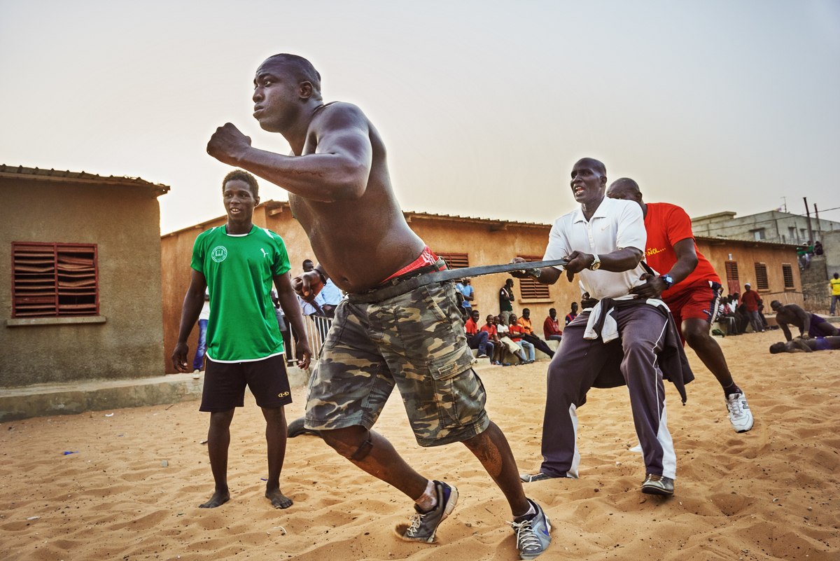  At Lac’s school, wrestlers spend months training for fights, usually training for hours each day. 