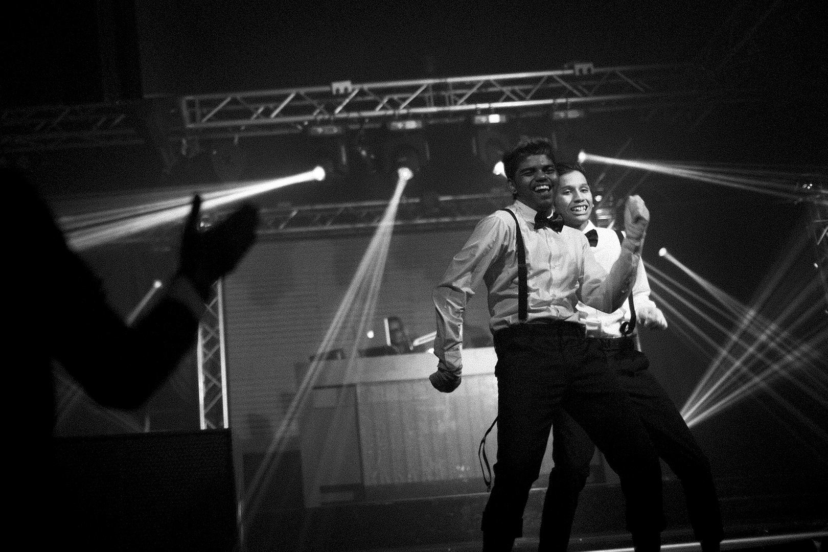  Dheena, one of Mel’s sons, and Melvinder, another Pluspoint member, take part in a pairs dance competition in a Singapore night club. 