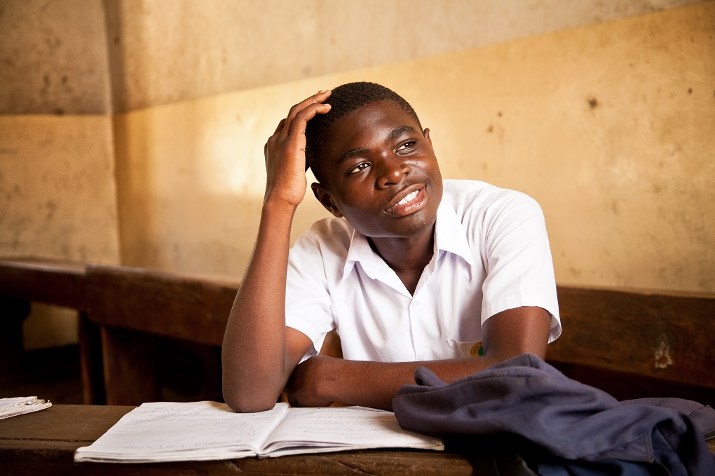  Jackson, 16, once thought he would never get an education. Though he was enrolled in school, his family made him work selling soap at a local market. Eventually he went to stay with an aunt who took him to Kigamboni Community Centre’s Drop Out Schoo