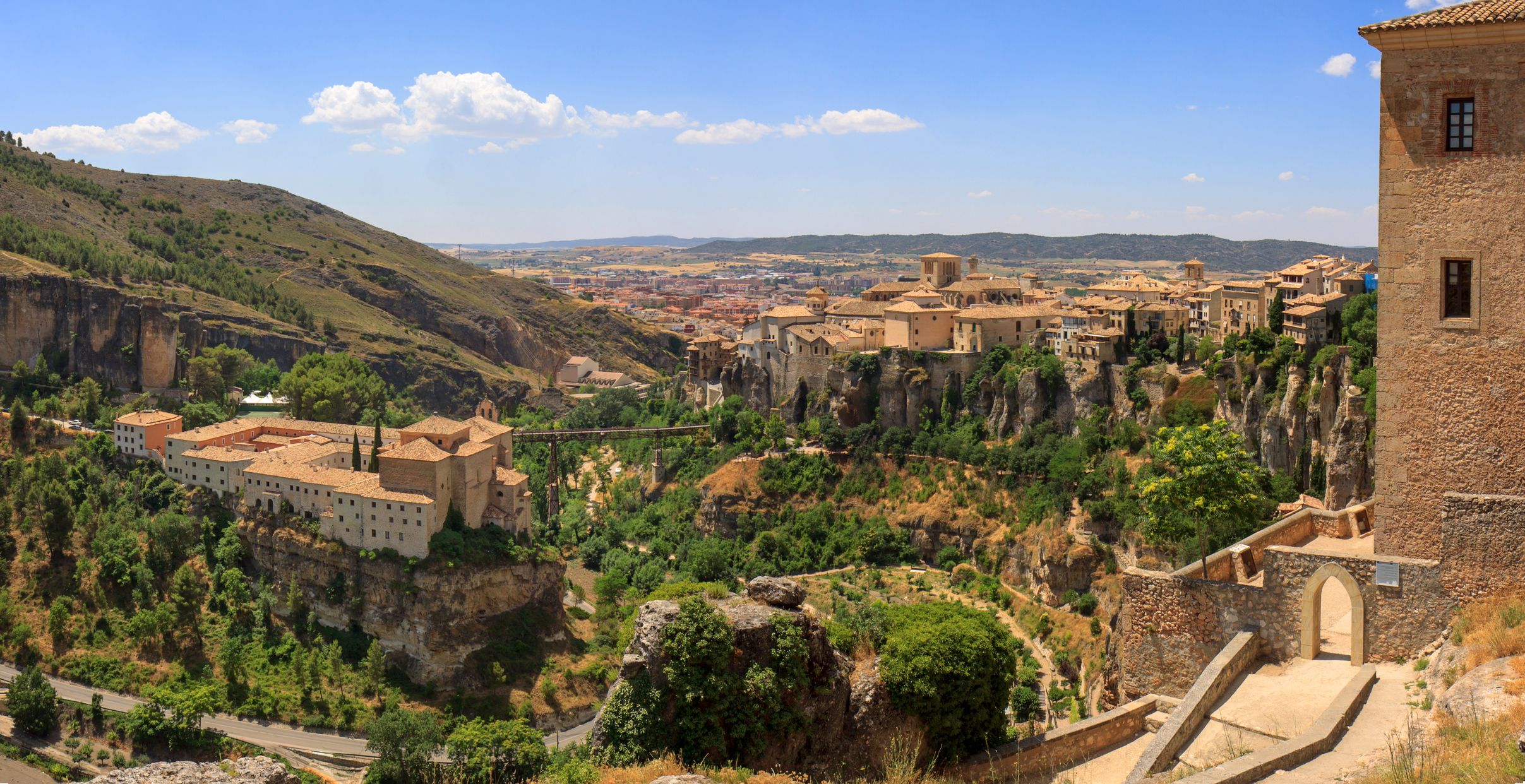 Panorama-of-monastry-and-old-town-of-Cuenca,-Spain-597645306_2420x1244.jpeg