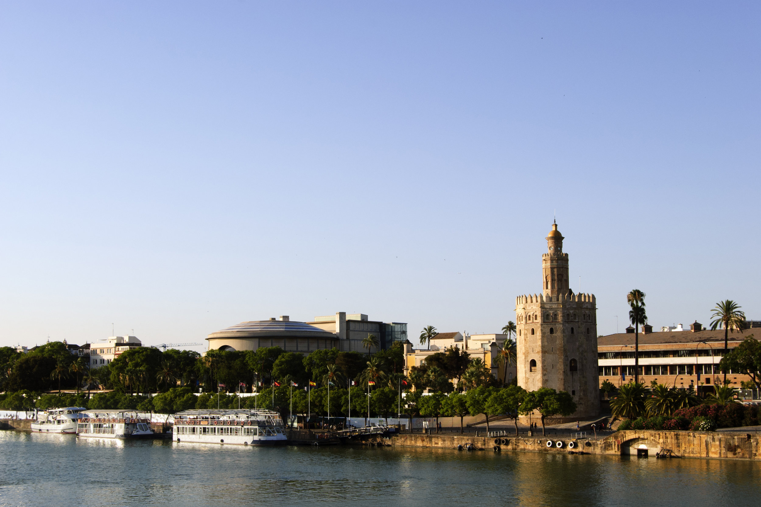 Panoramic-view-of-Seville-riverbank-with-the-Torre-del-Oro-833234404_3830x2553.jpeg