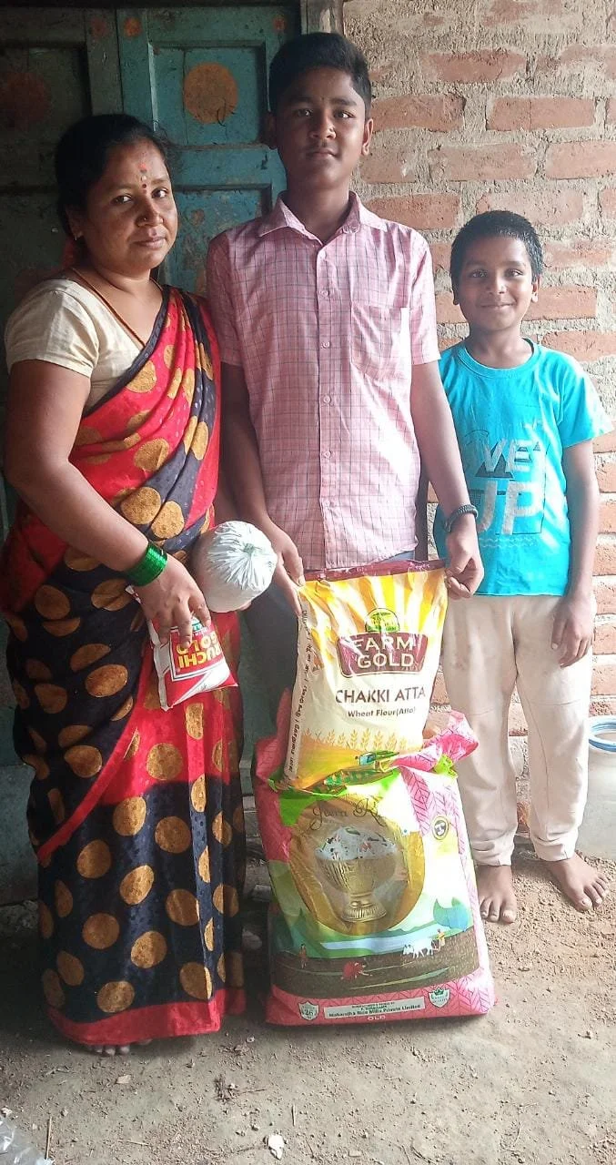 3029. Rahul from Pathakotte with crisis food kit.jpg