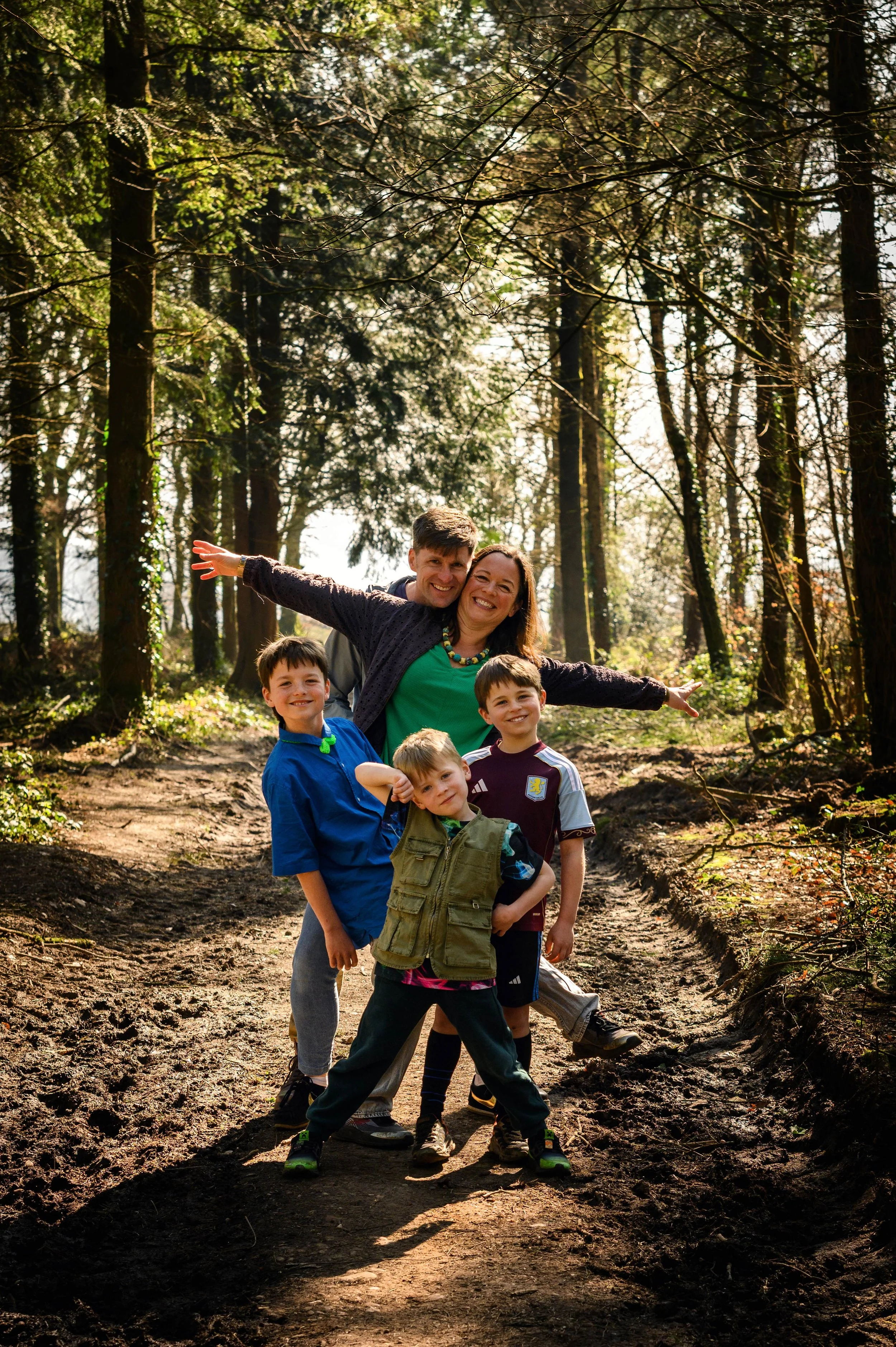 Relaxed family portrait taken outdoors near Exeter