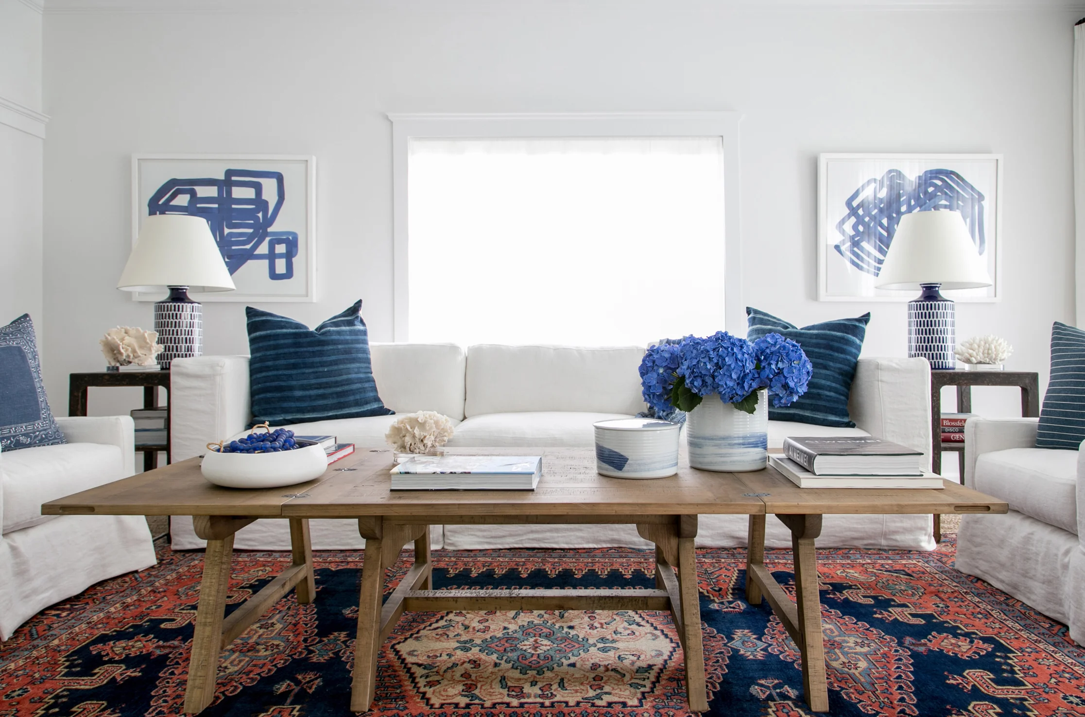 04. East Hampton New Traditional by Chango & Co. - Living Room Front After.jpg