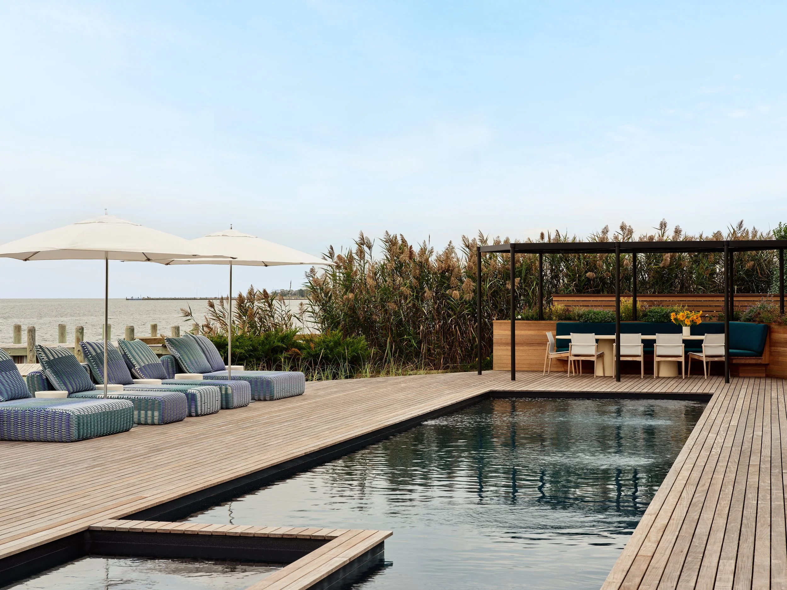 20. Fire Island Beach House by Chango - Pool & Outdoor Dining.jpg