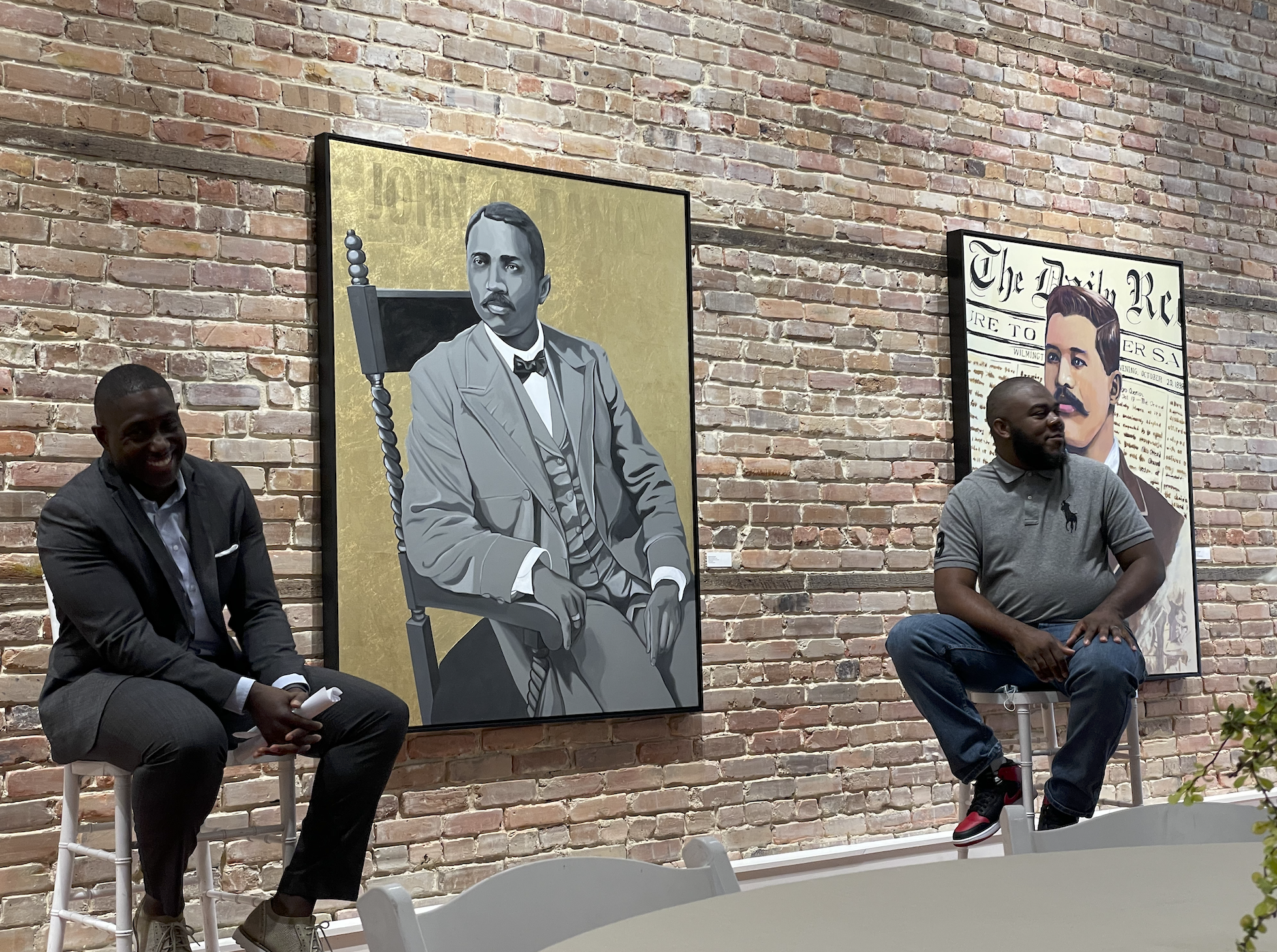  Conversation with artist Clarence Heyward at “Continuum of Change” from June.  Photo by Justin Wilson . 