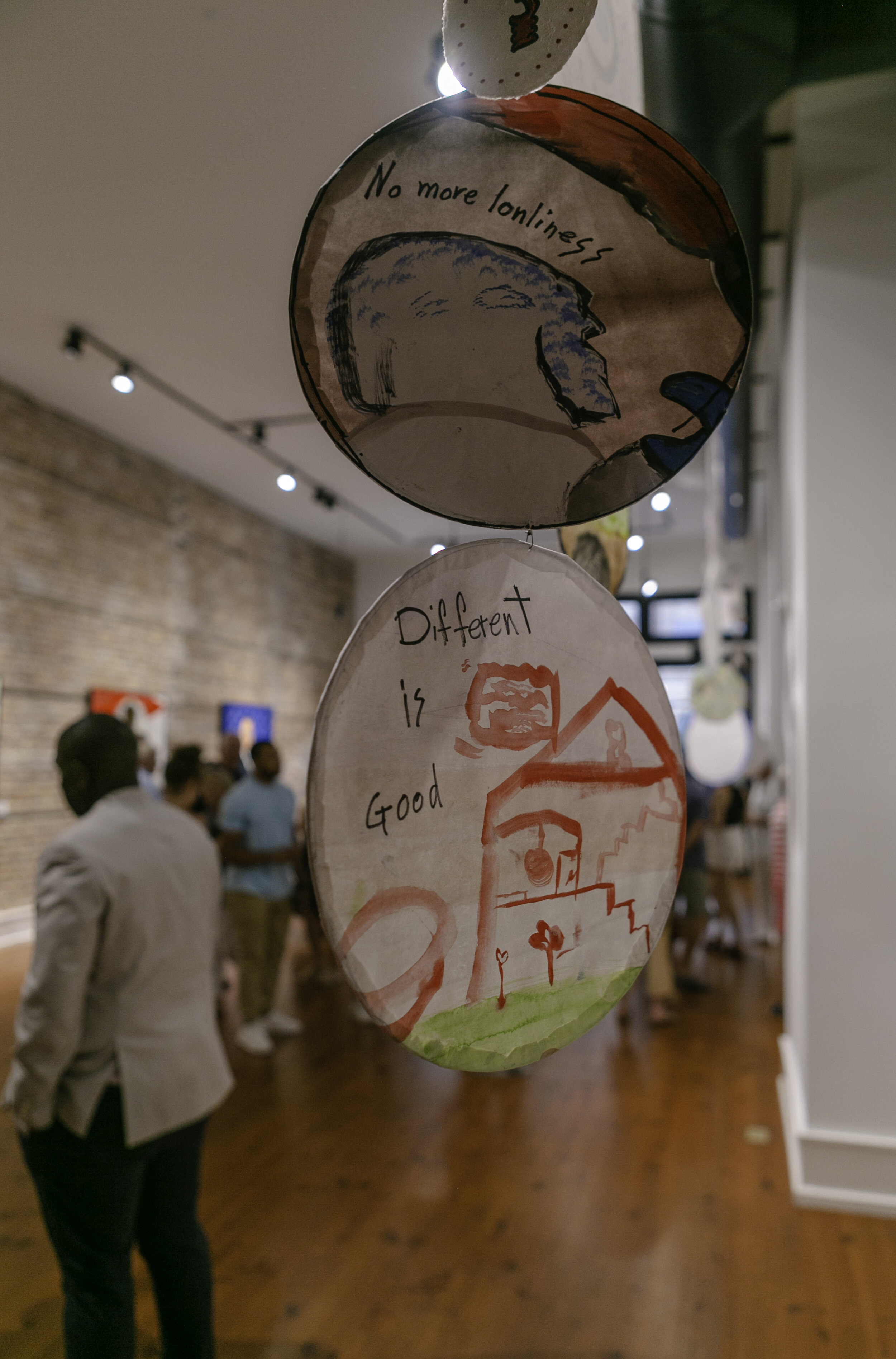  Photo from the Fourth Friday Gallery Walk in July. This is a student installation by youth from DREAMs of Wilmington. The students worked with artists Fritzi Huber and Israel Sorenson.  Photo by Lindy Schoenborn.  
