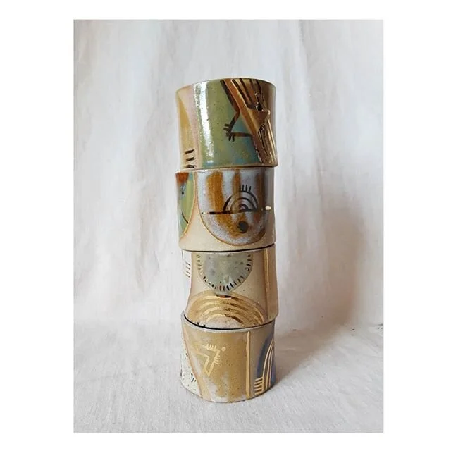 Totem pole of flat bottom liquor sippers!  A special order, for a much appreciated customer.  Tons of made-to-order items are always available in the webshop. #curioisclay #goldluster #liquorsipper