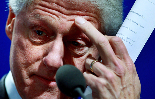 Clinton is subtle as he gives the bird to America's black activist in 2016...