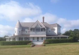 This is a porch that beckons passers-by to come, rest, and share the gorgeous ocean view.