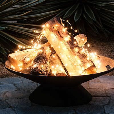 Fairy lights mixed with real wood is a winner