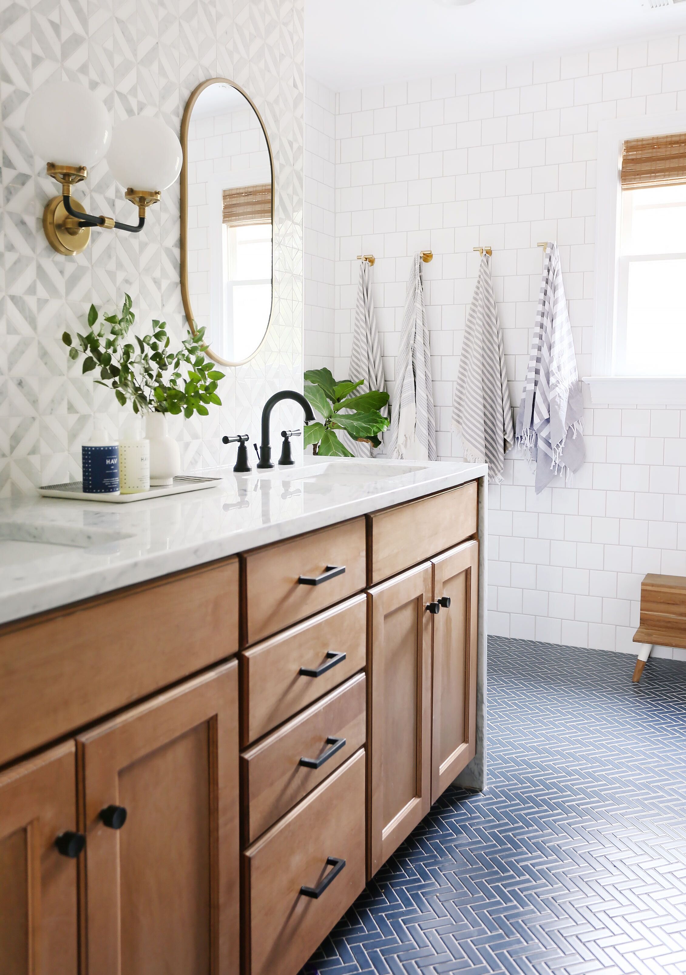 Guest bath reveal_ Geometric Tiles and soft modern farmhouse features.jpeg