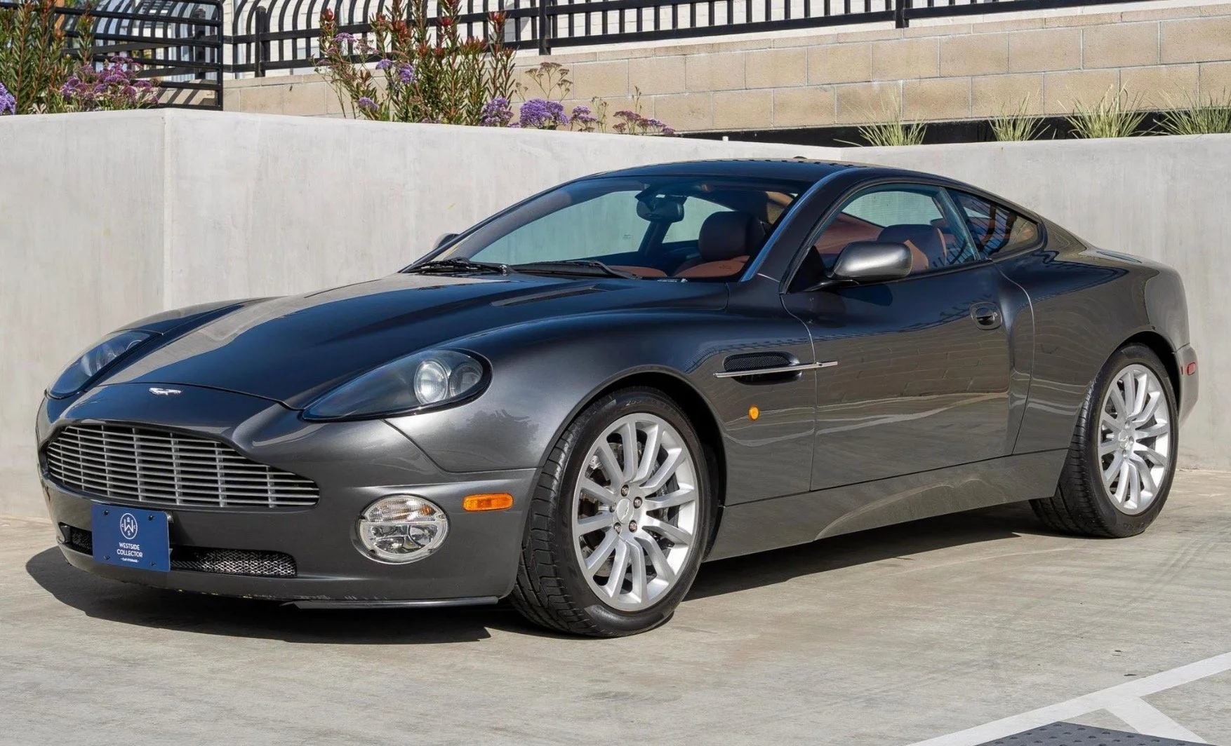 Someone is going to STEAL this Vanquish that @westsidecollectorcarstorage has on @carsandbids right now. Sold new in MA, it was crashed with just 3,000 miles on it a year later and repaired at a cost of over $130,000. It was fixed so well that he sol