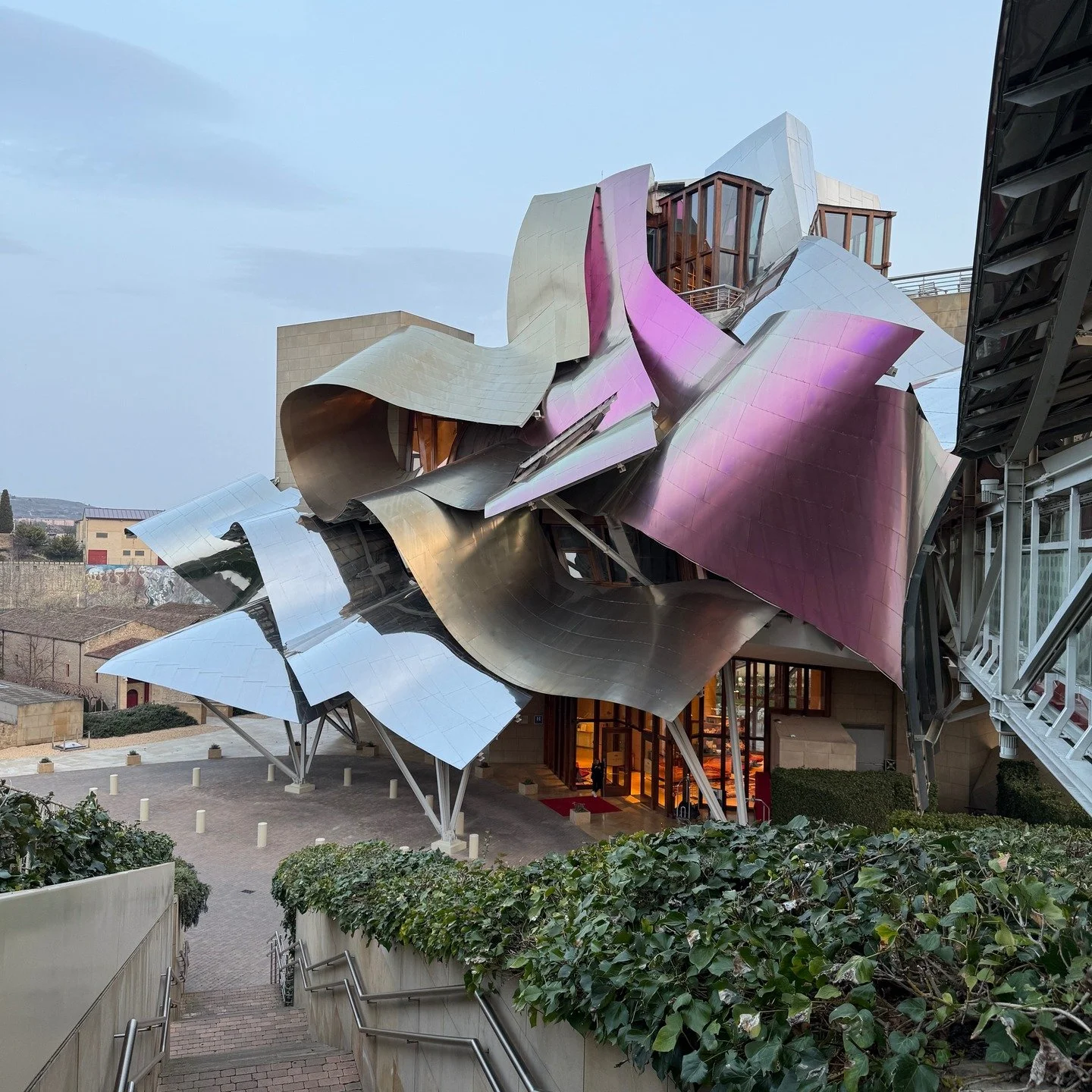 I am rarely impressed with a press launch hotel to the point of posting about it, but @astonmartin location division does not fuck around. Look at this unbelievable Frank Gehry thing I'm staying at, with the batshit facade juxaposed against the flawl