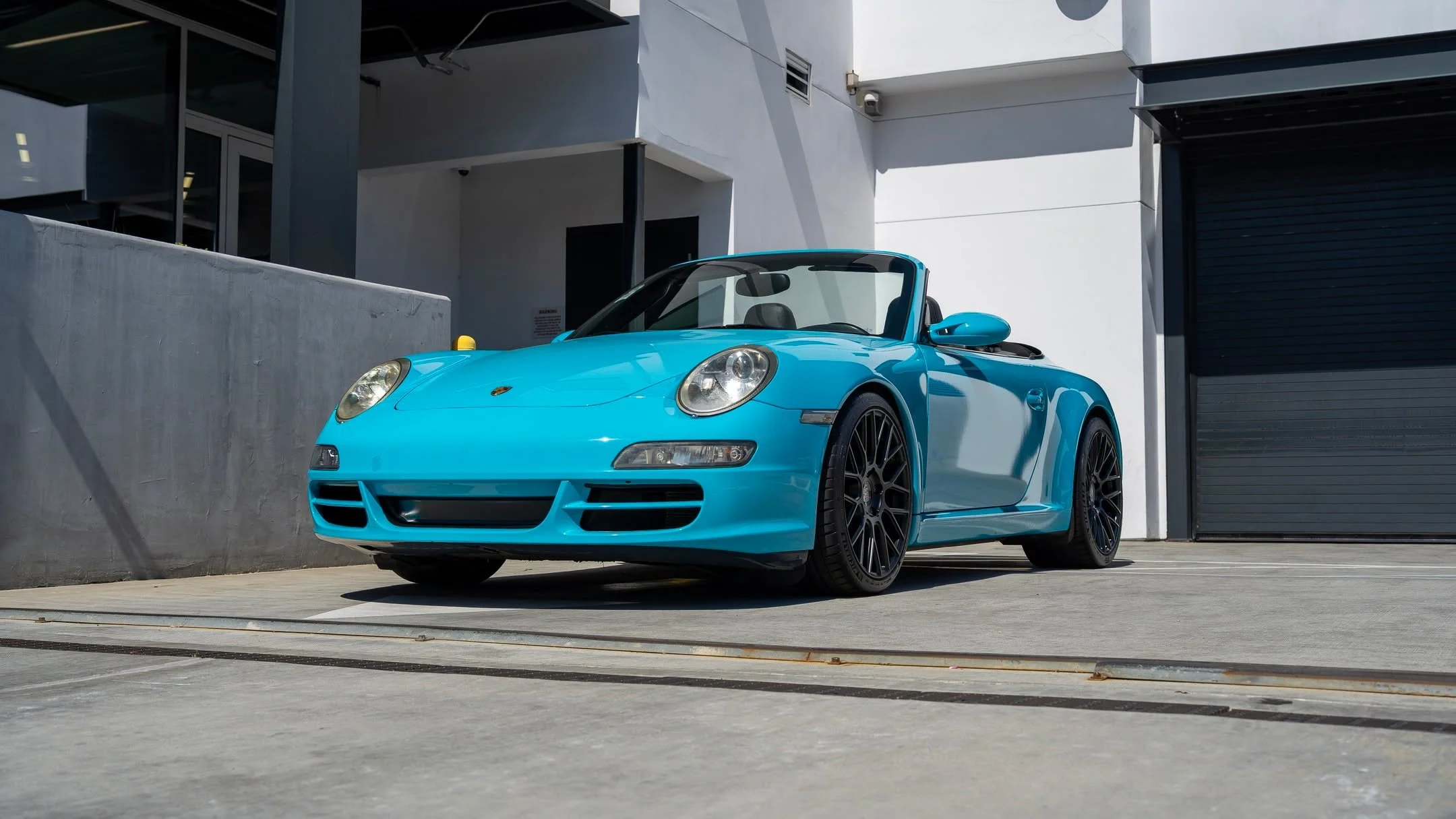Perfect first-time Porsche! Now live on @carsandbids we at @westsidecollectorcarstorage are happy to present this 2007 Porsche 911 Carrera S Cabriolet six-speed! This wrapped drop-top is guards red under there, and has tons of service records. Check 
